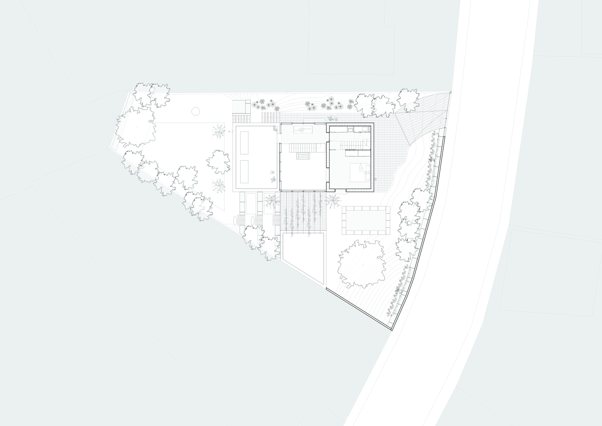 Upper floor plan drawing showing bedrooms and a central staircase with exterior terraces