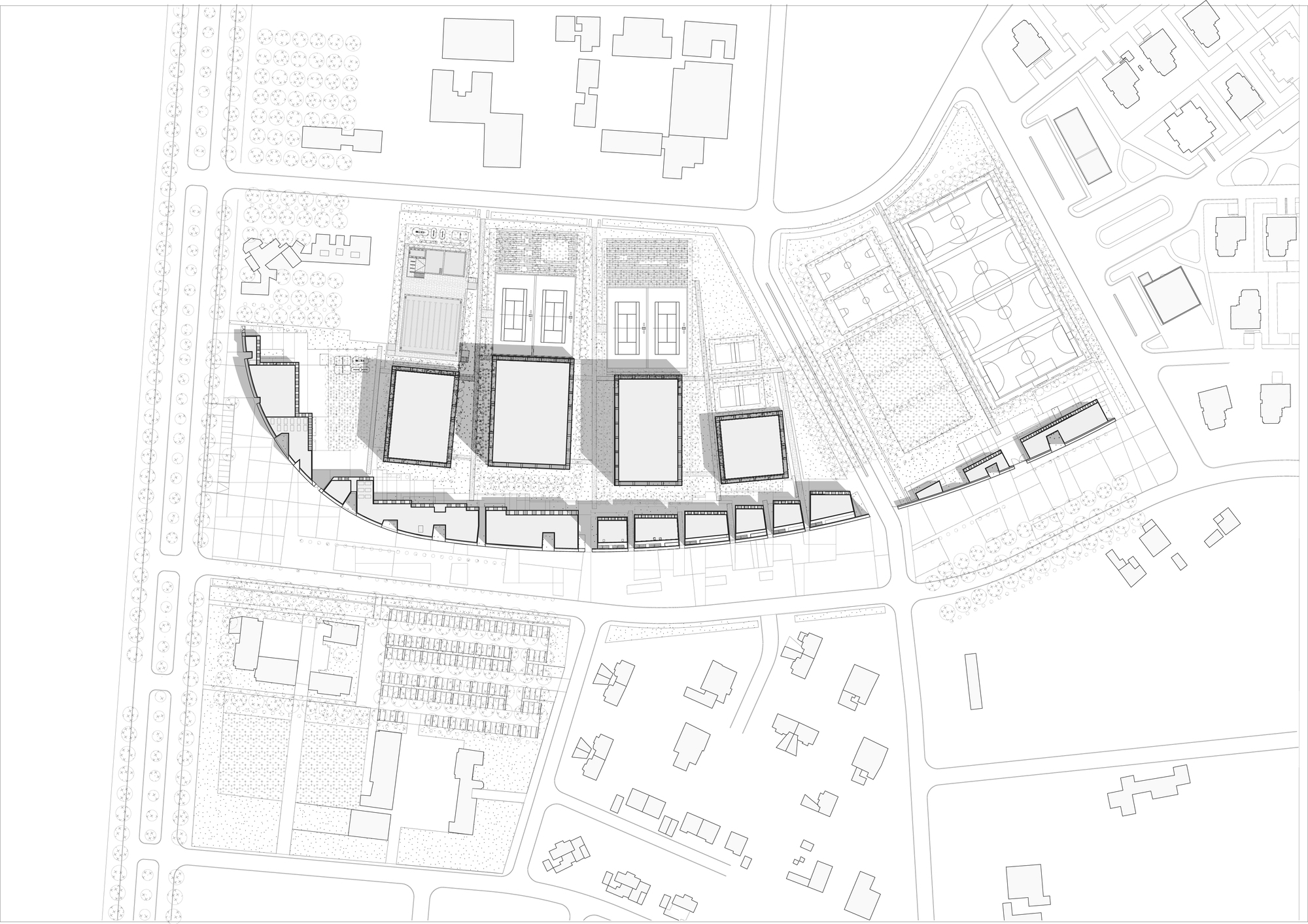 Site plan drawing showing four rectangular building volumes arranged along a curved plot boundary