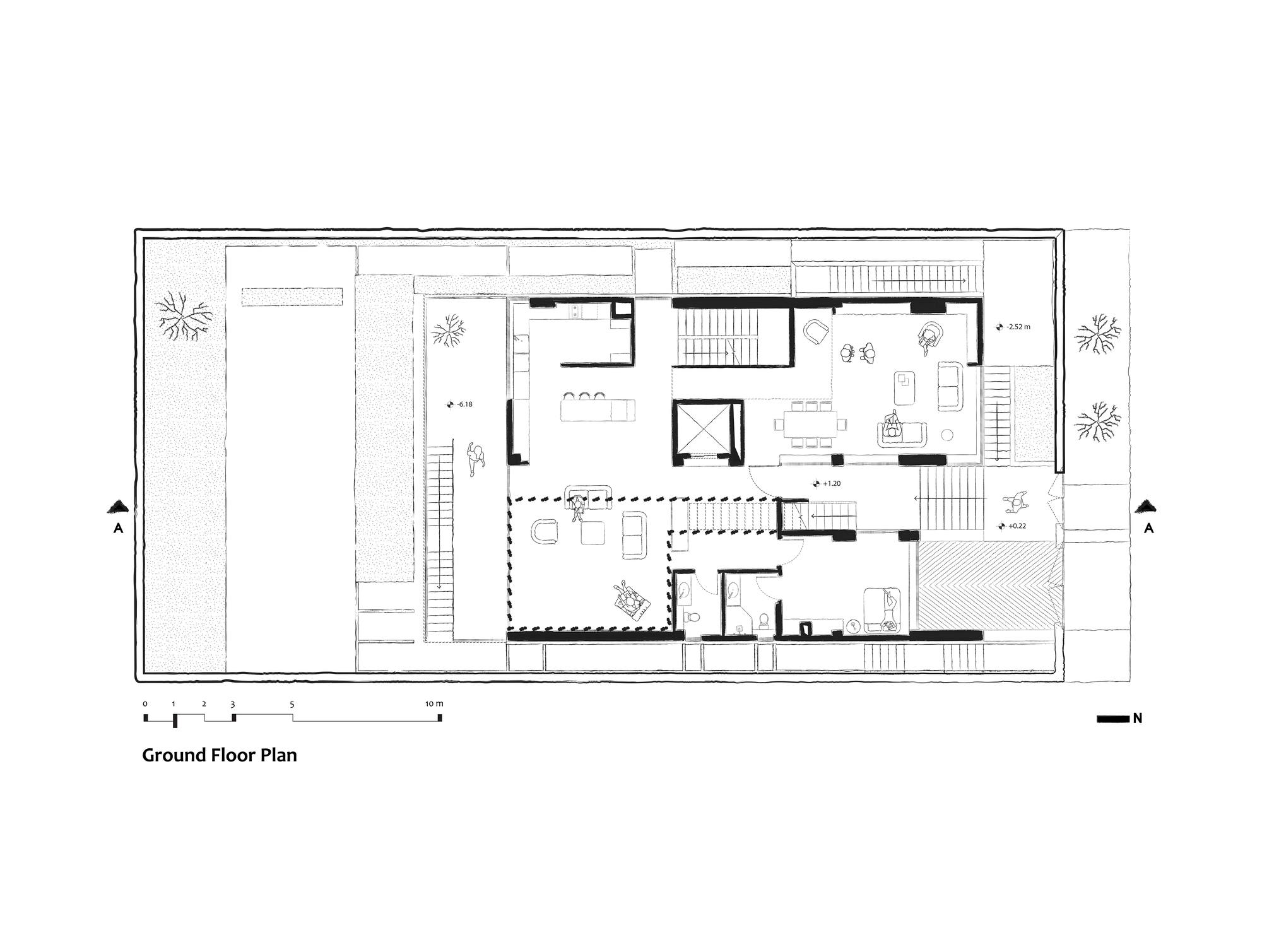 Ground floor plan drawing showing two residential units with central courtyards and staircases