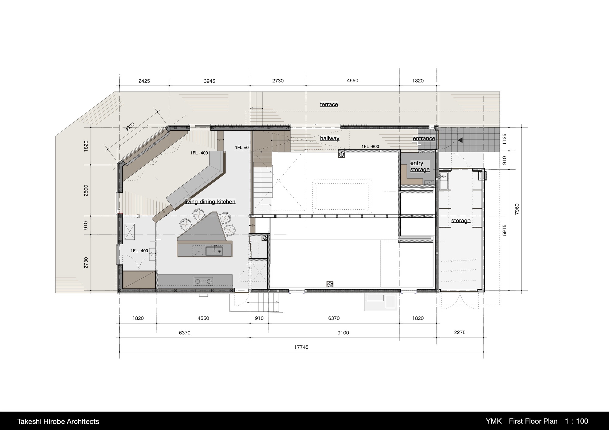 First floor plan drawing showing an angled living-dining-kitchen zone and a central hallway with storage