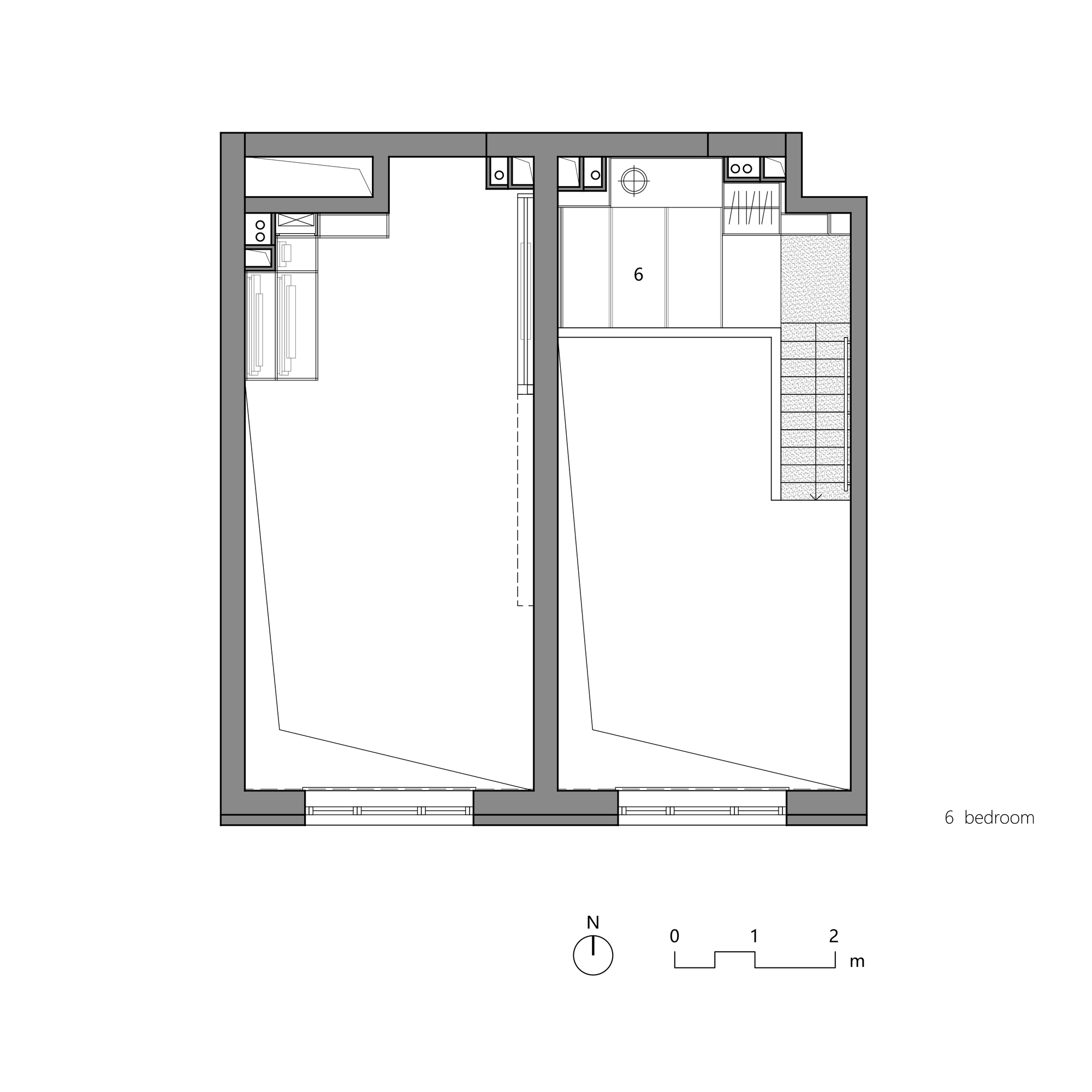 Floor plan showing a bedroom level with ensuite and staircase