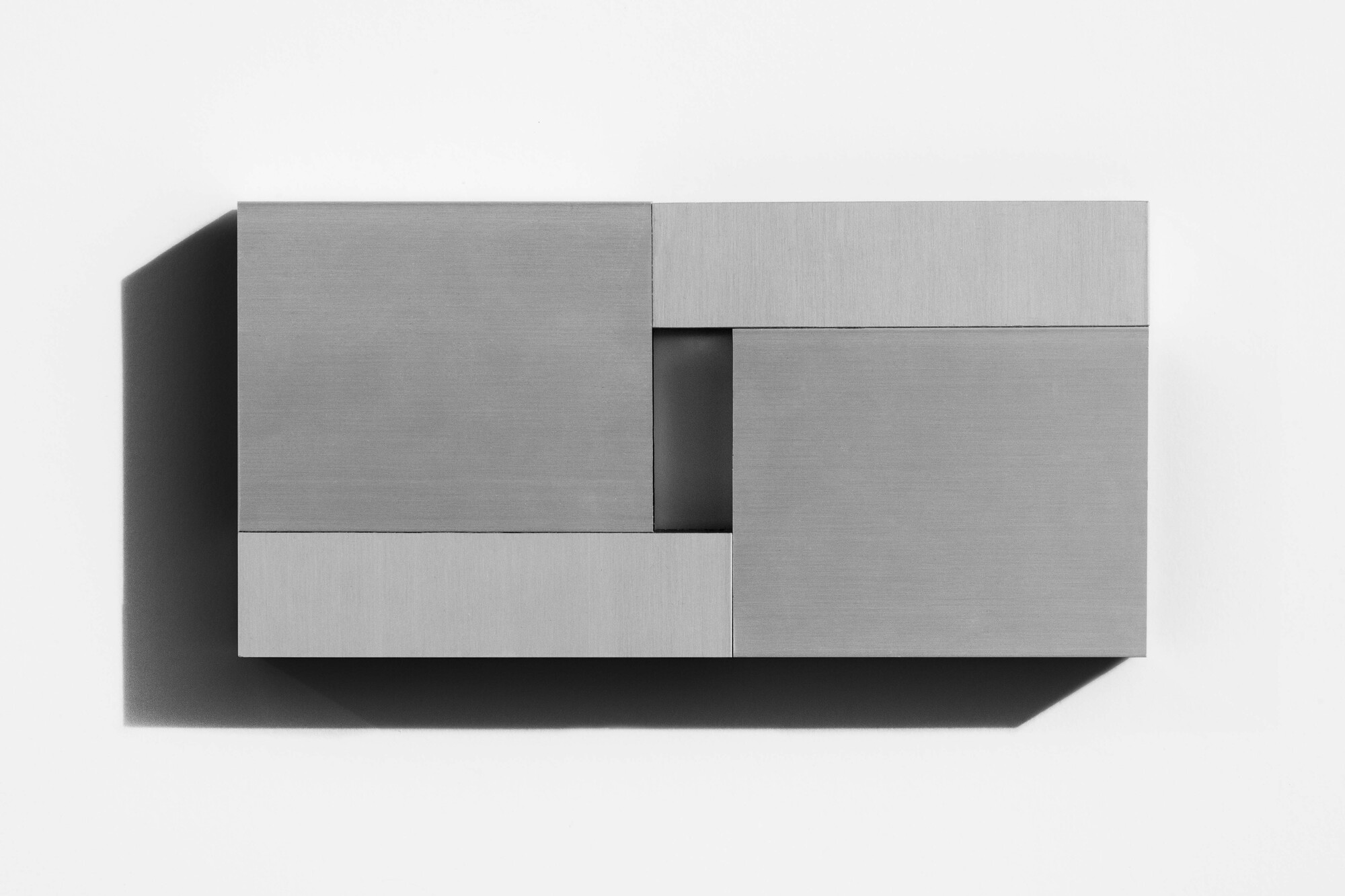 Elevation view of architectural model showing rectangular volumes with an offset window opening