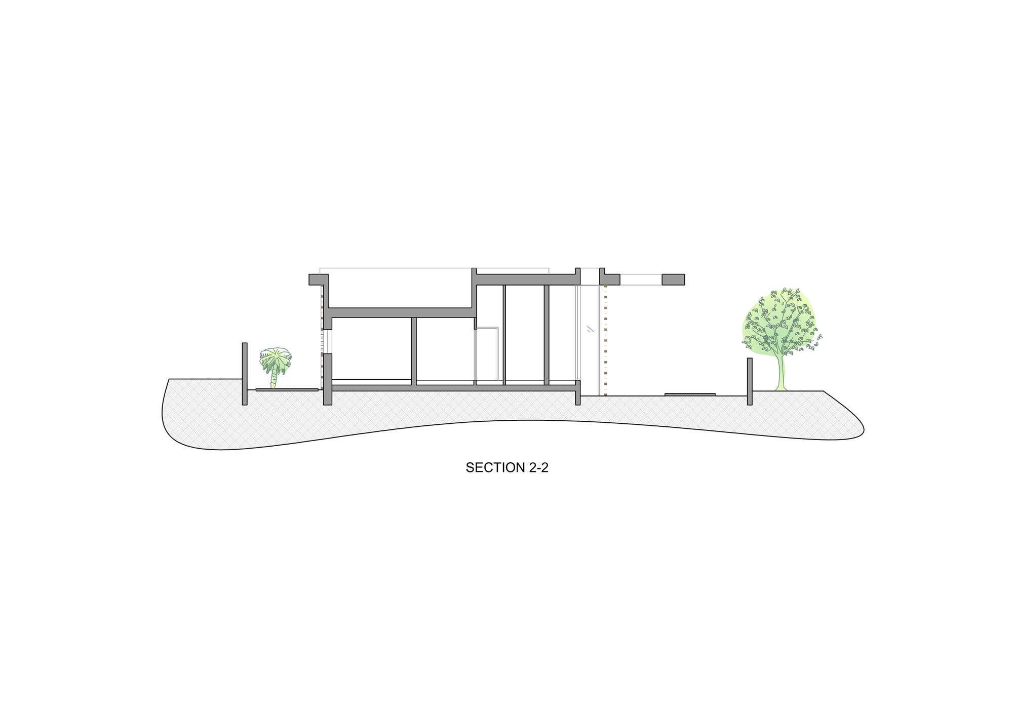 Section drawing revealing double height spaces and material transitions on sloping terrain