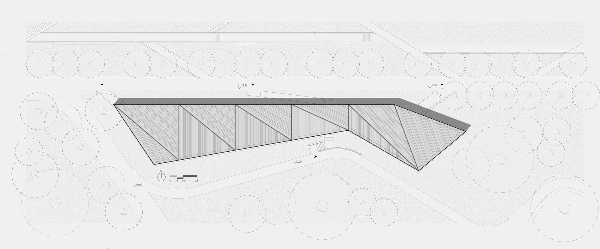 Roof plan drawing showing angled volumes with hatched surfaces amid circular tree canopies