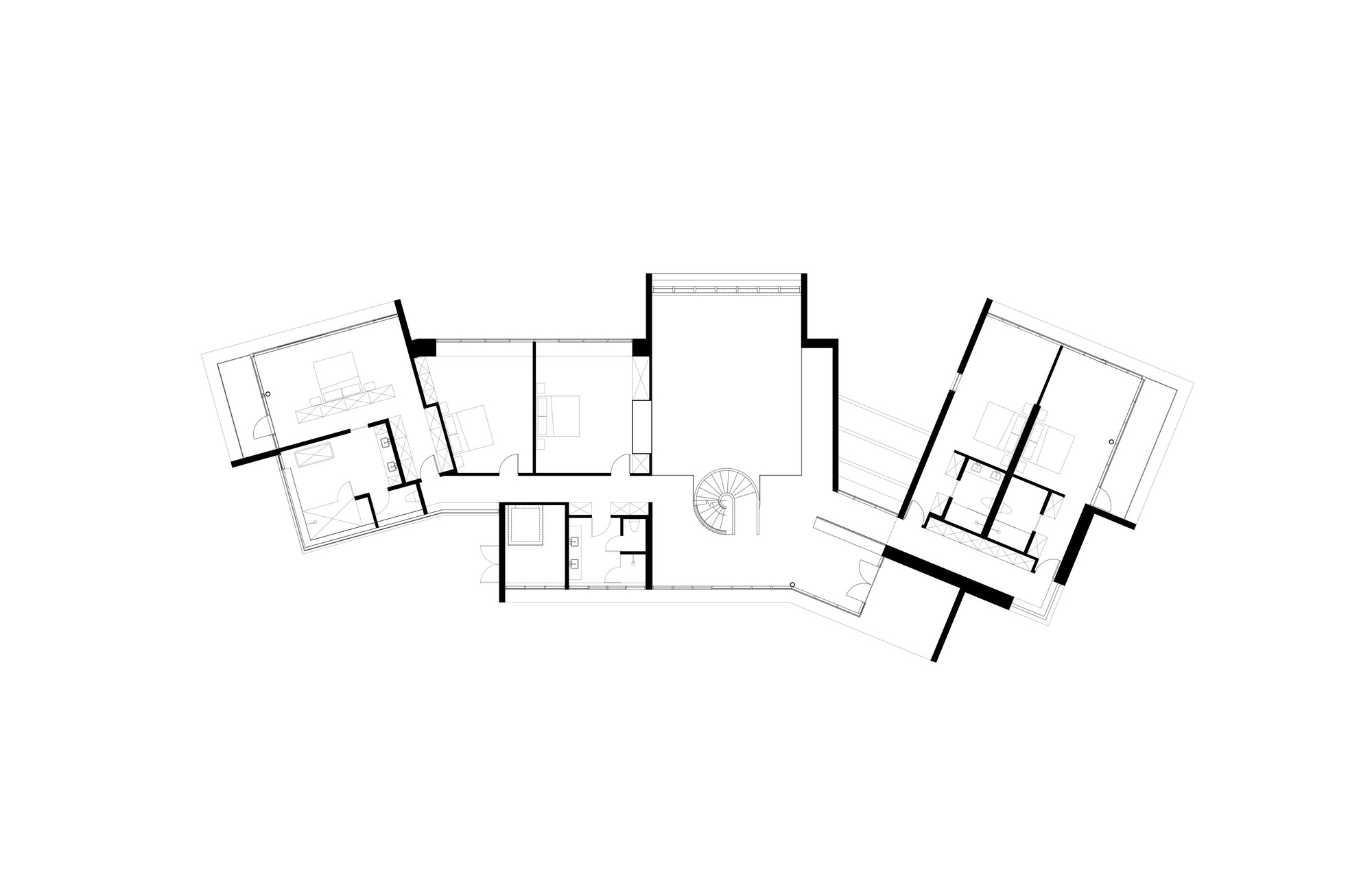 Floor plan drawing showing four angled volumes arranged around a central spiral staircase