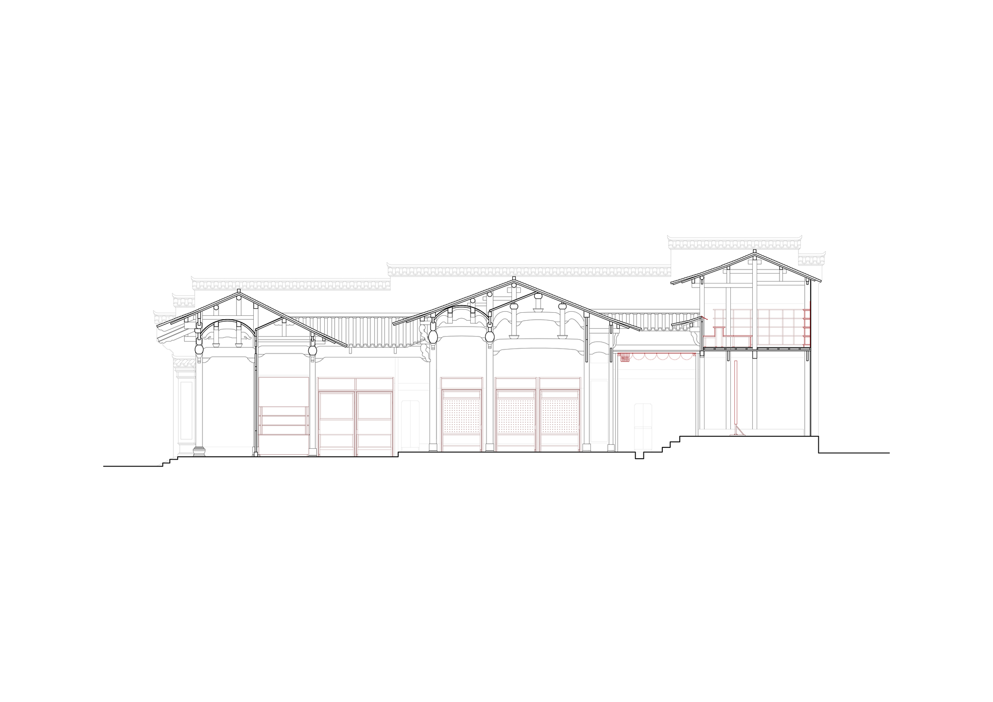 Section drawing revealing pitched roof structures with timber trusses and varying ceiling heights