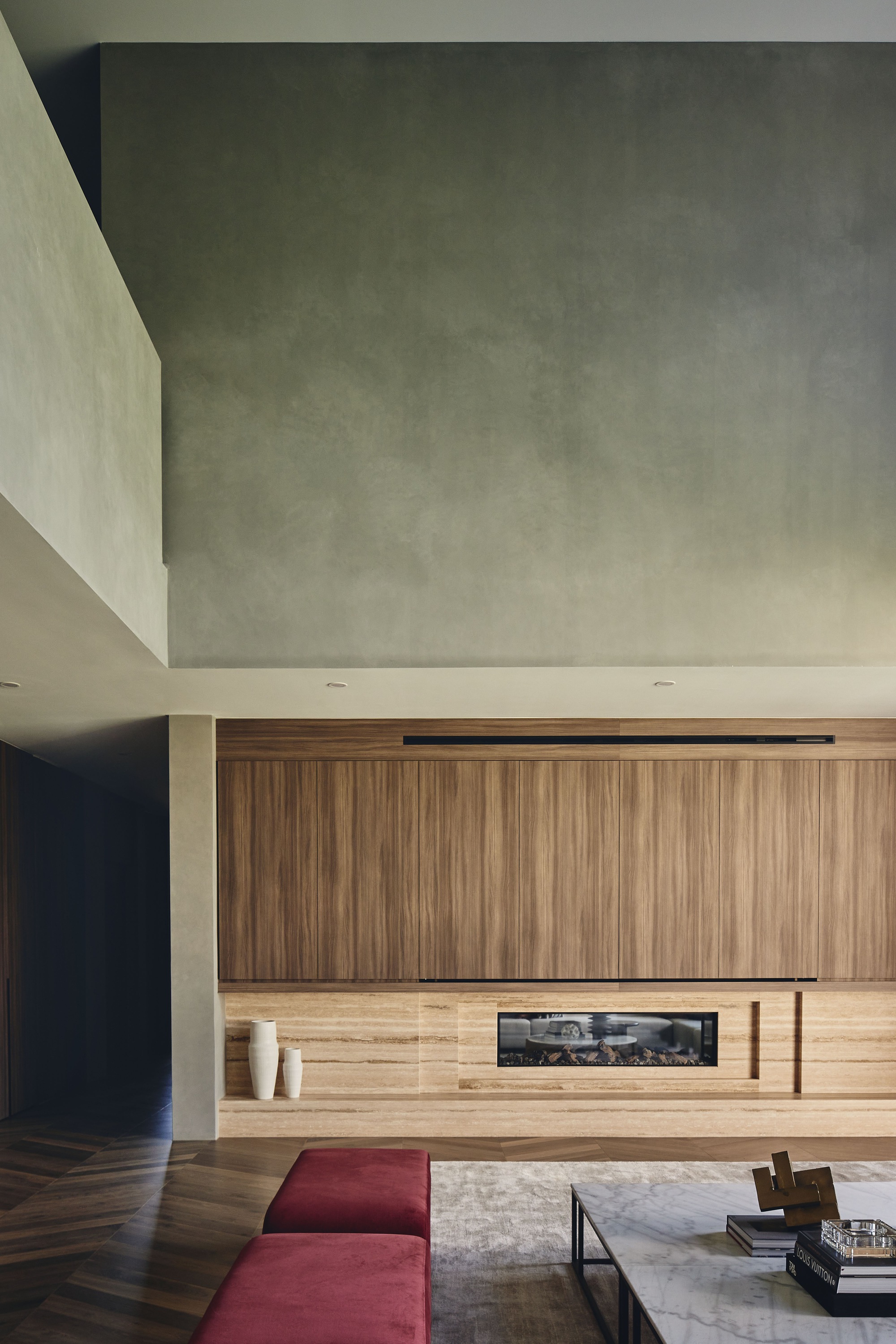Living room with horizontal timber joinery and polished concrete ceiling