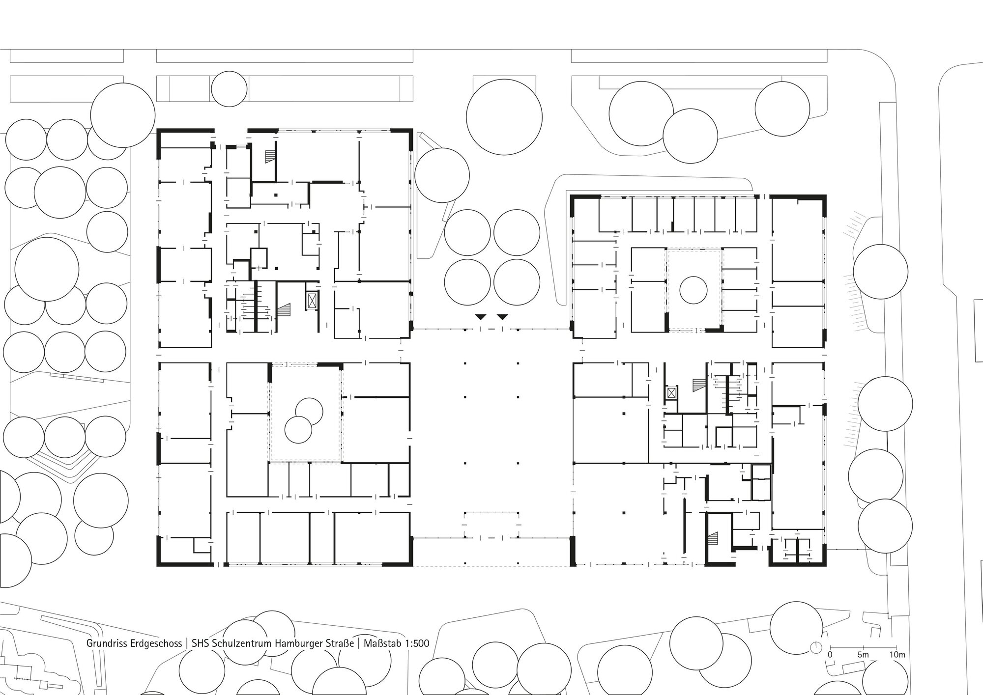Ground floor plan drawing showing four building volumes arranged around a central courtyard with trees