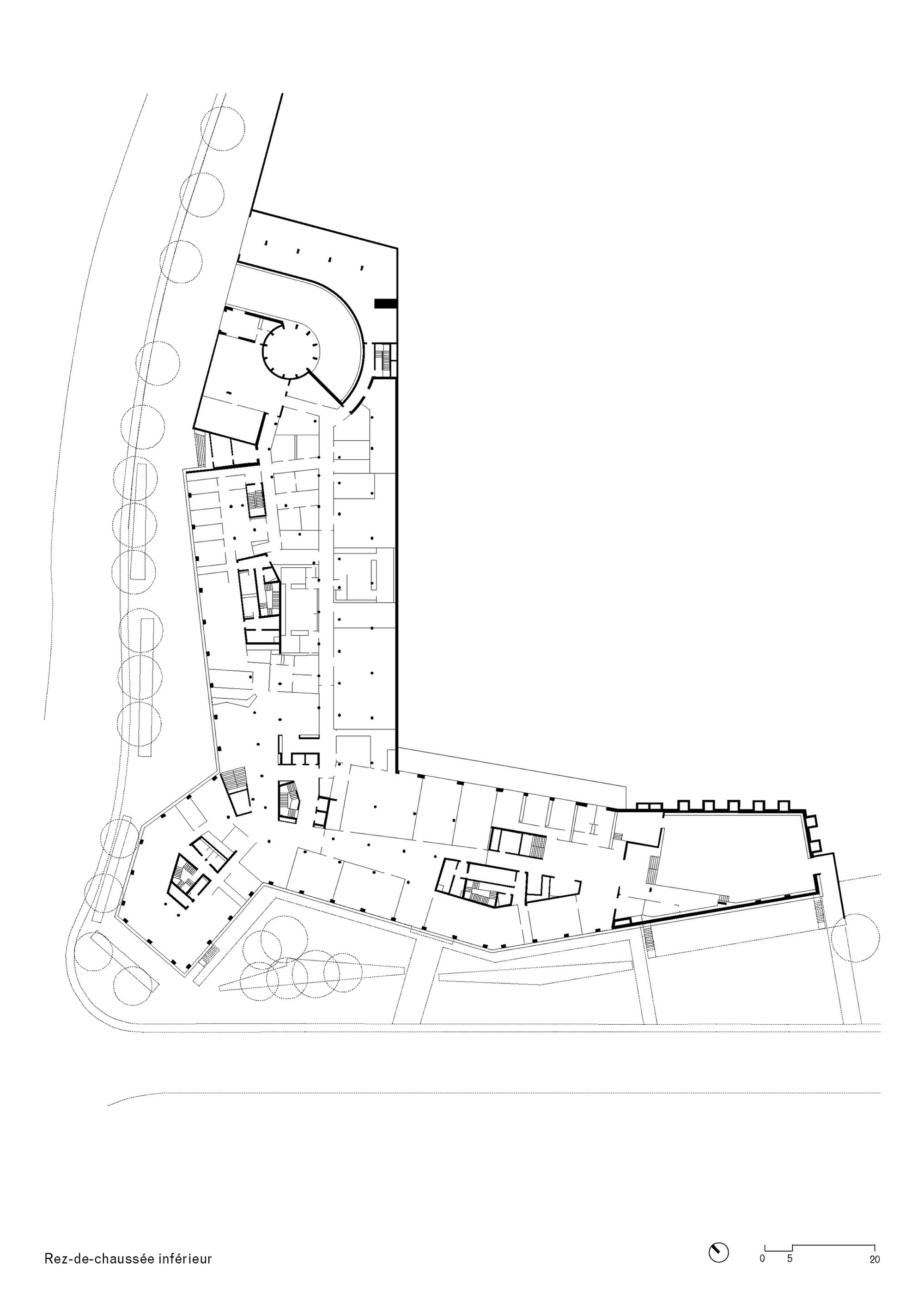 Ground floor plan drawing showing an angled three-winged building layout with surrounding landscaping
