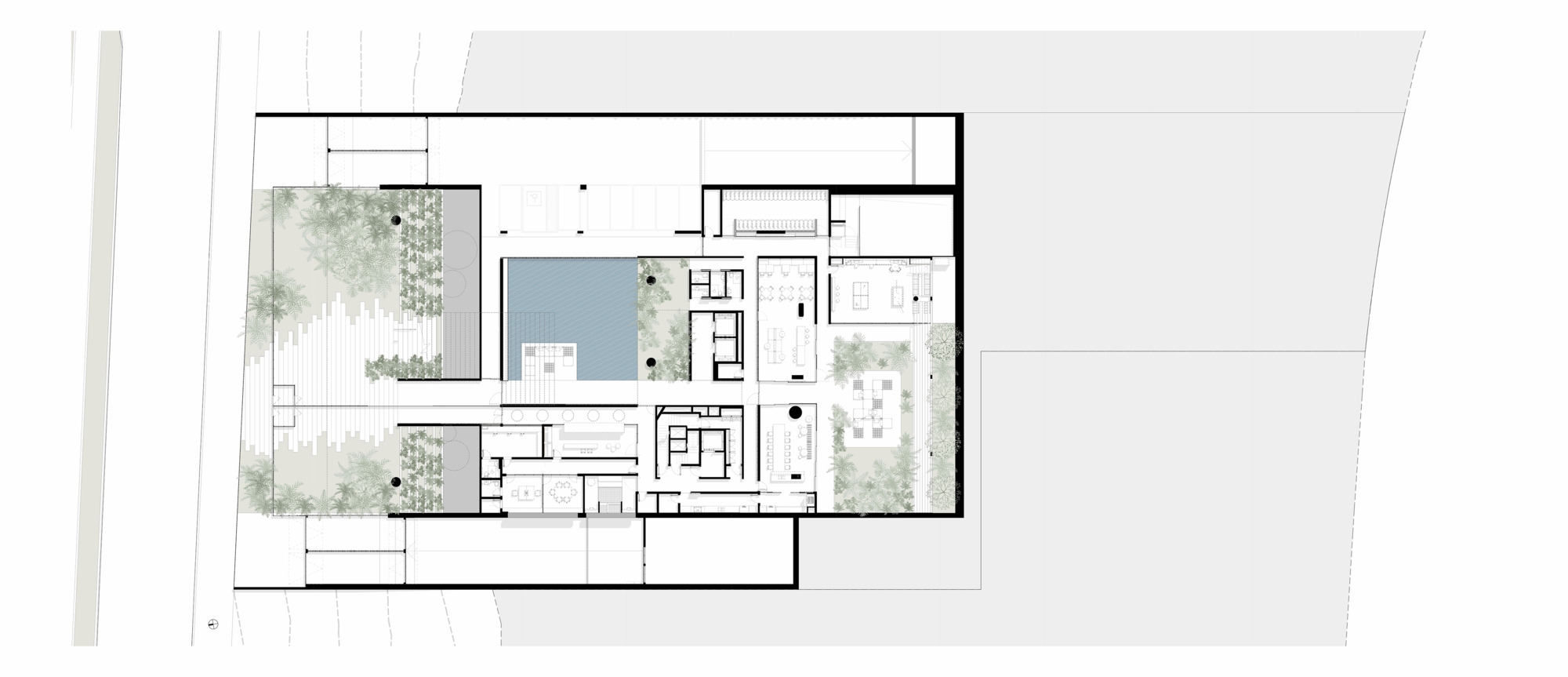 Floor plan showing rooms arranged around courtyards with planted gardens and a central pool