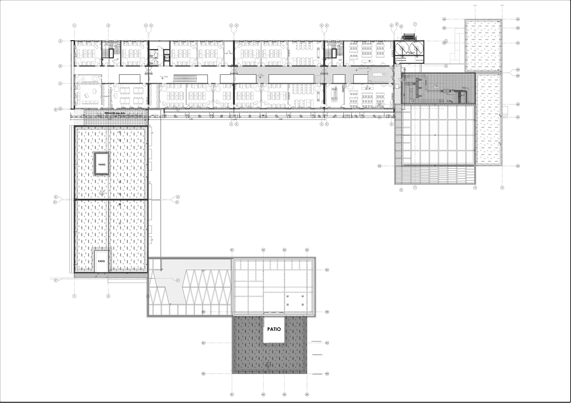 Floor plan drawing showing the classroom wing, labeled patio courtyard and outdoor planting zones