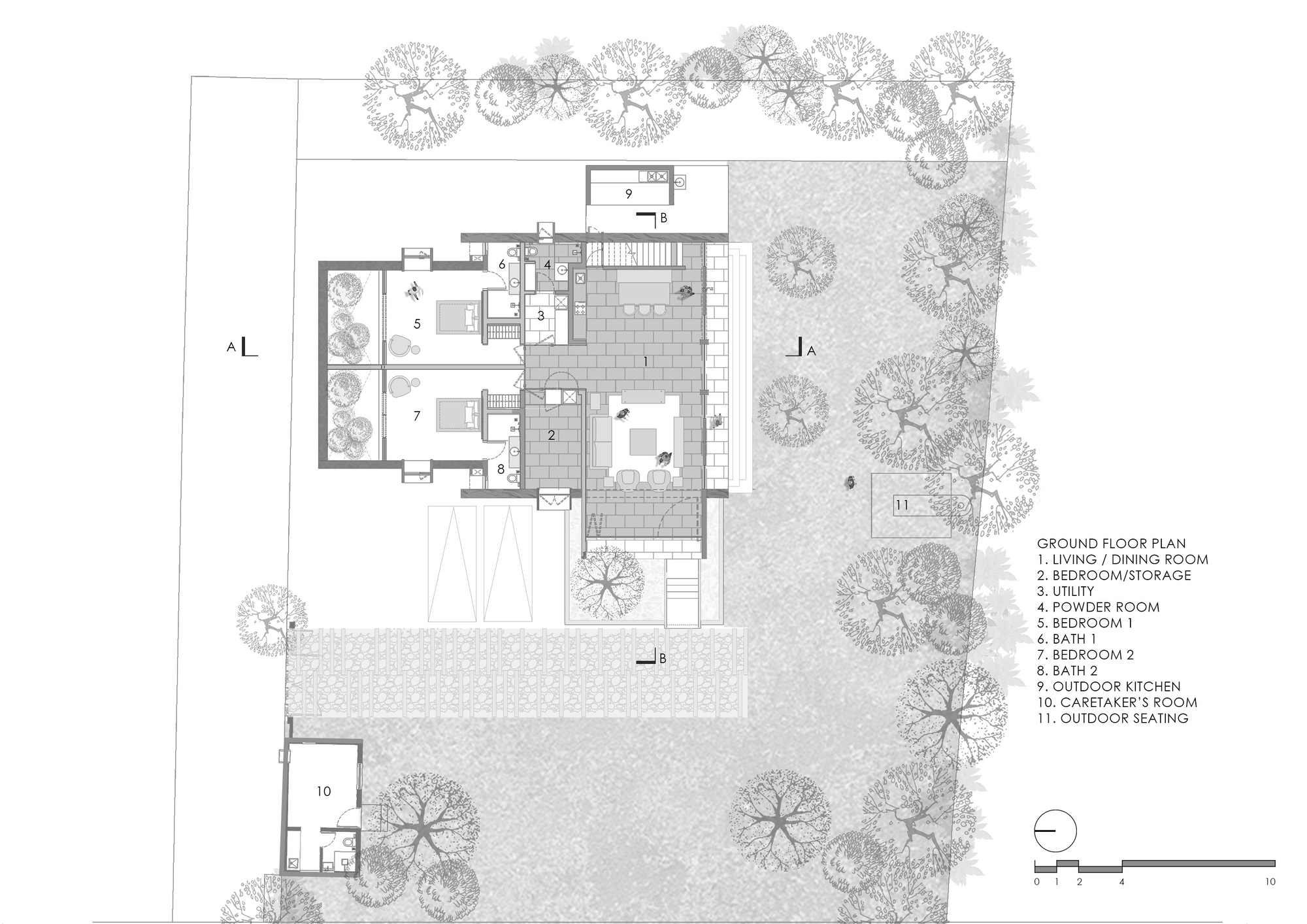 Ground floor plan drawing depicting living spaces, bedrooms, and outdoor kitchen surrounded by landscape