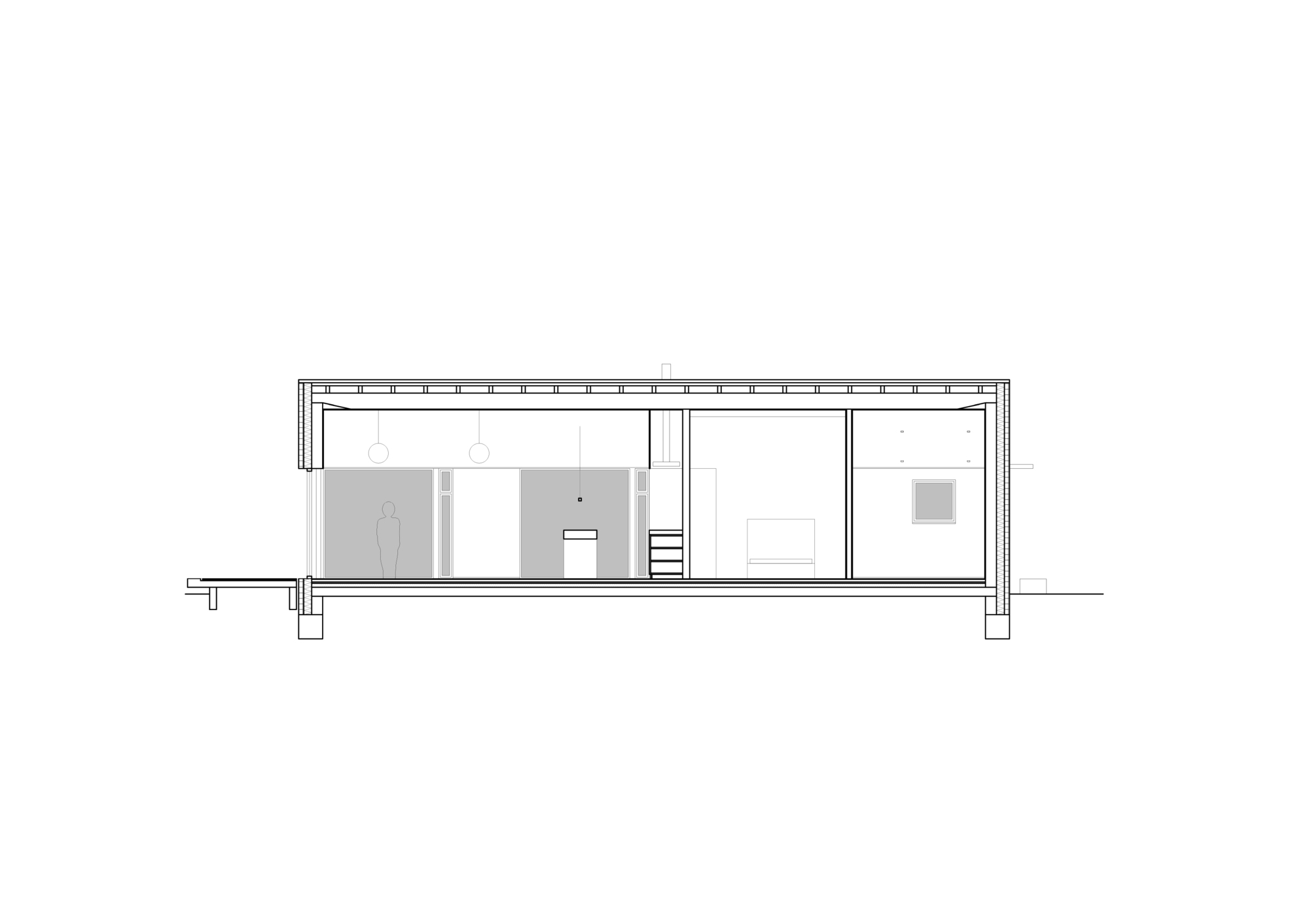 Section drawing revealing the interior layout with exposed roof structure and partition walls