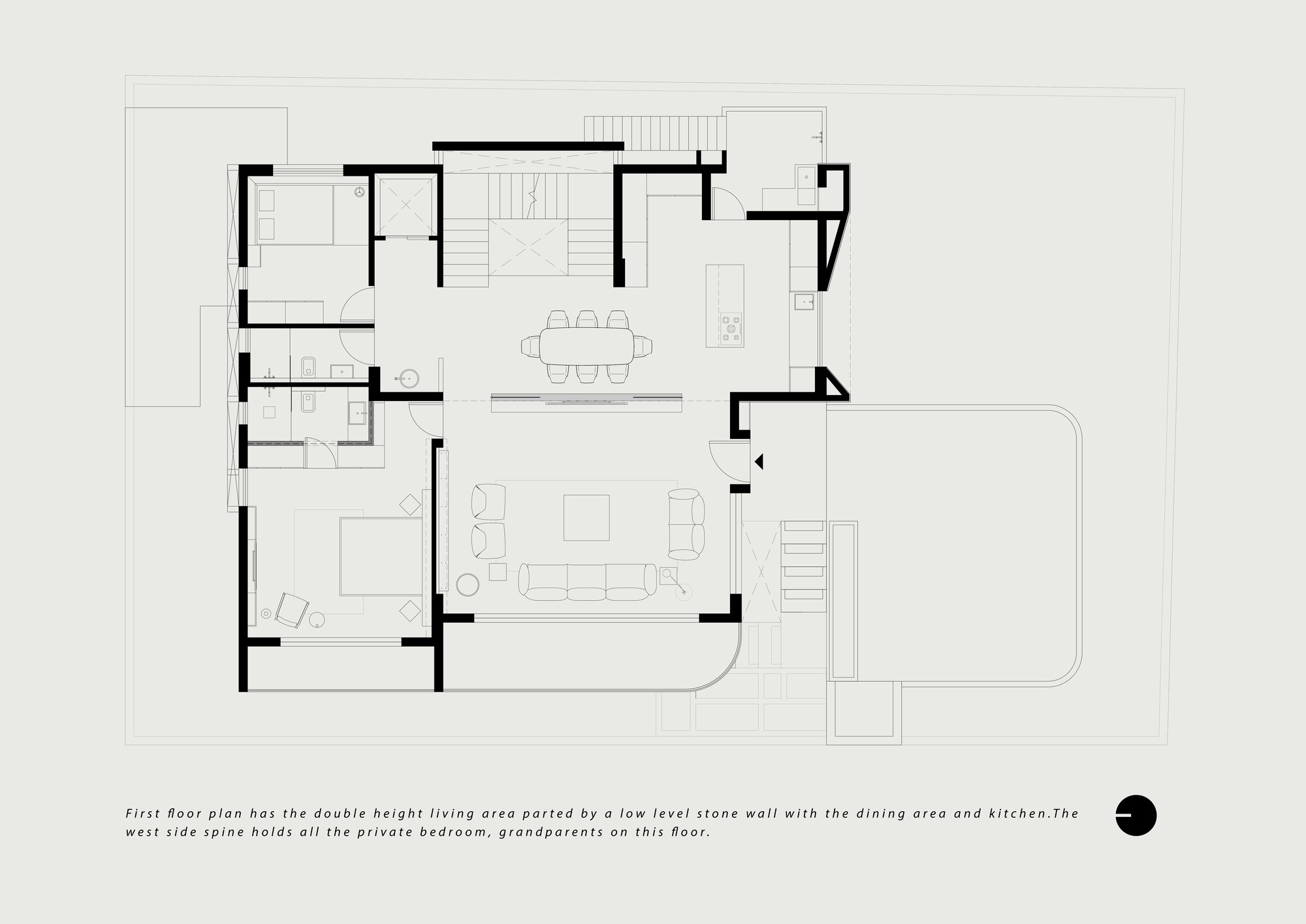 First floor plan with double-height living area divided by a low stone wall separating dining and kitchen