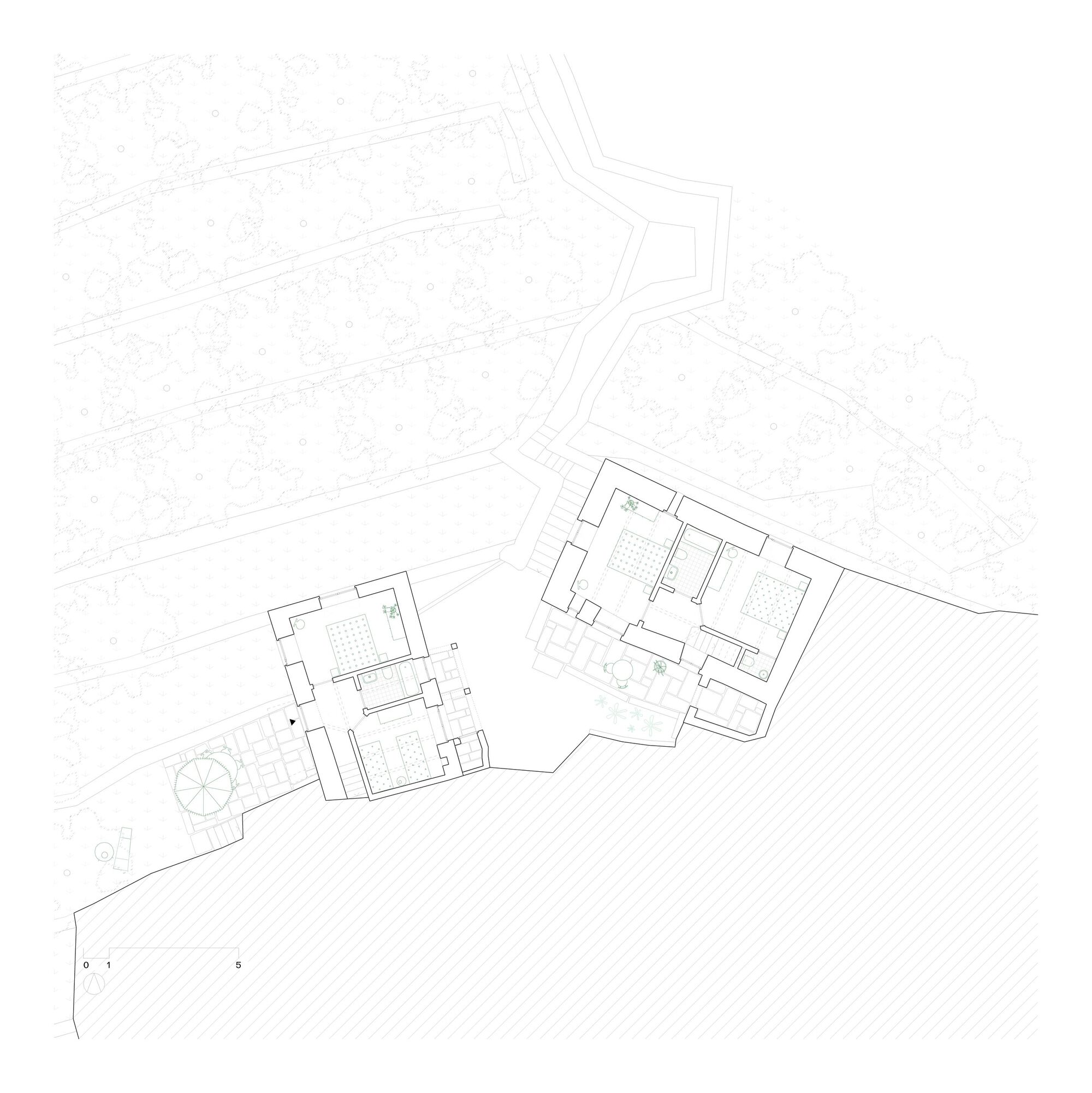 Floor plan drawing revealing interior room layouts and wall thicknesses of two connected structures