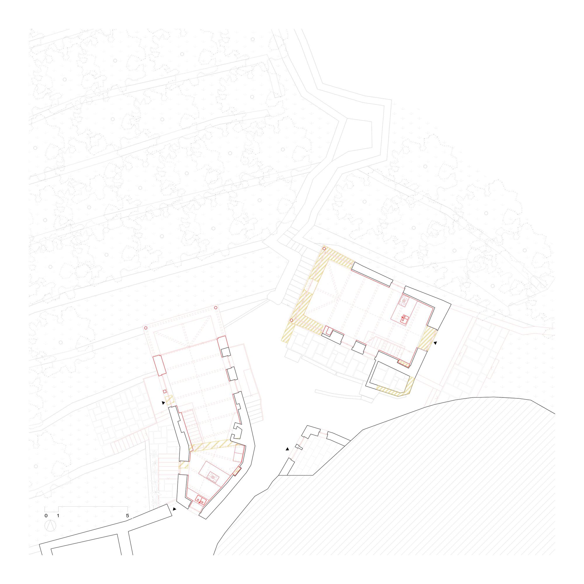 Site plan with highlighted building footprints and circulation zones in orange and yellow