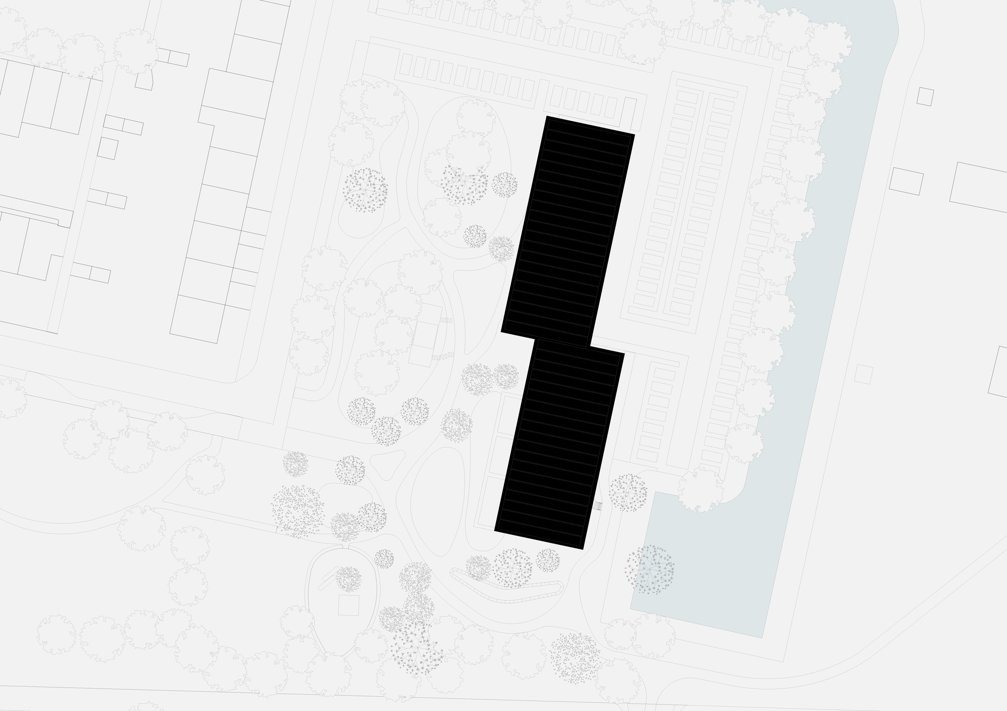 Site plan showing two tower footprints in a landscaped park beside a waterway