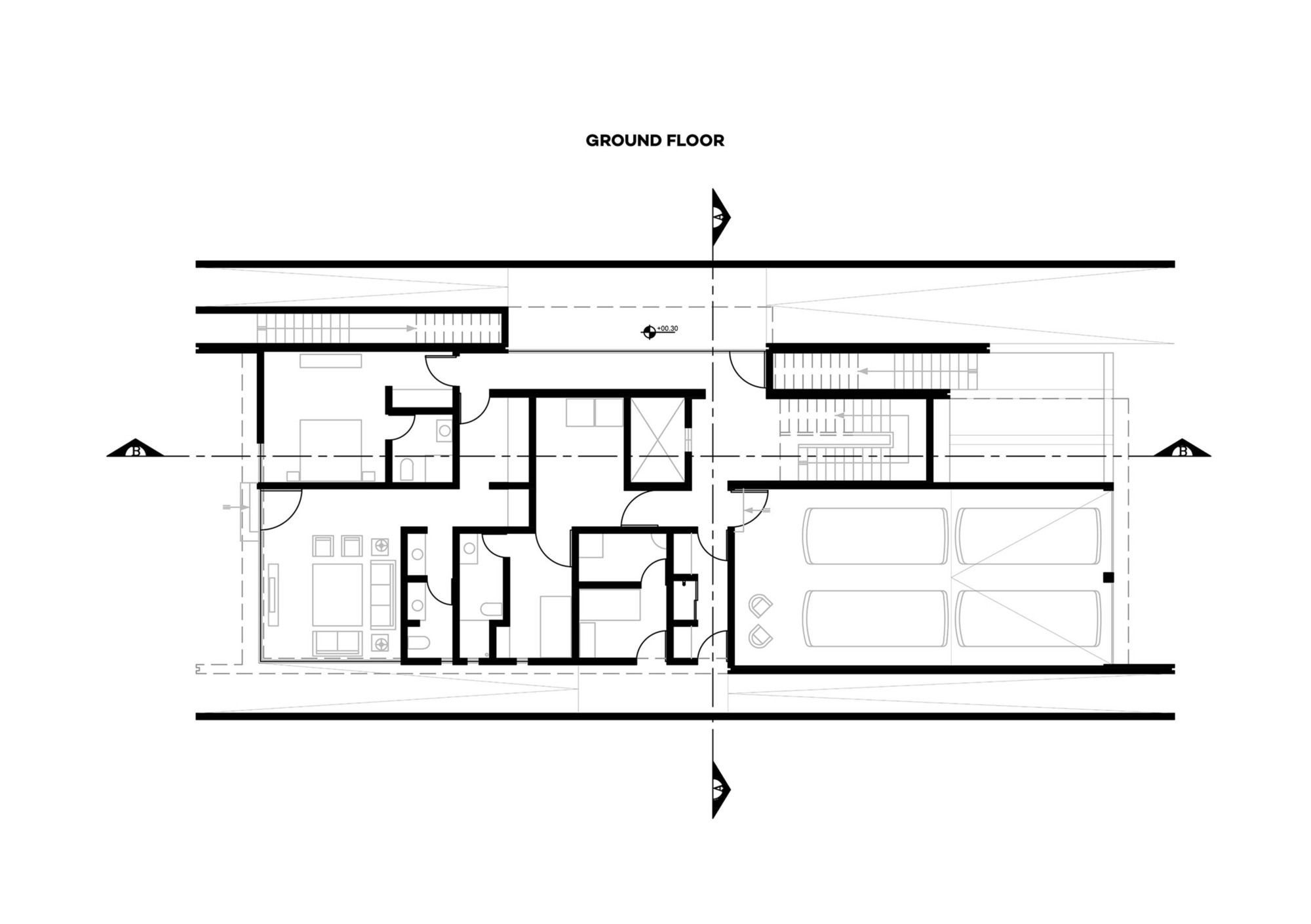 Ground floor plan drawing showing central living areas flanked by two staircases and garage at right