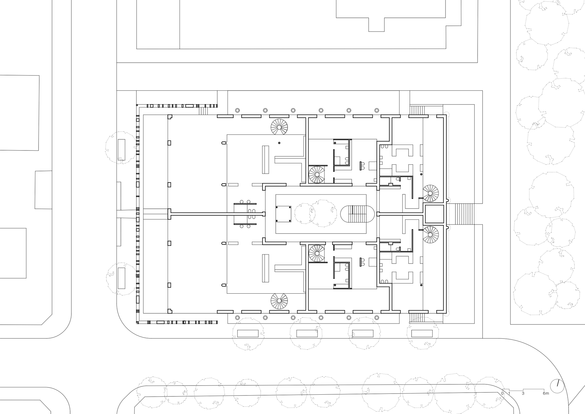 Second floor plan drawing showing smaller residential units clustered around circulation cores