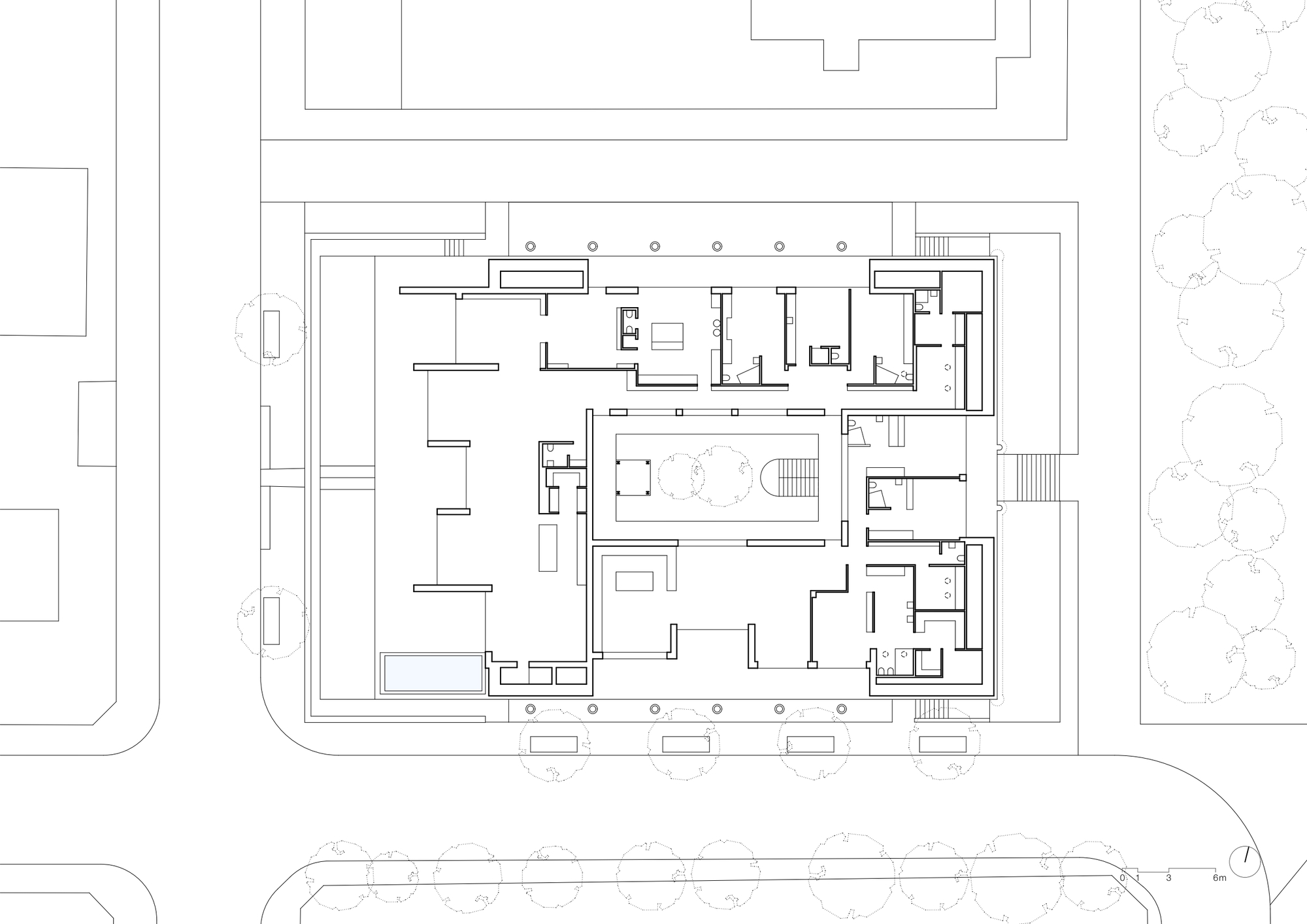 Third floor plan drawing showing recessed upper level units with perimeter circulation