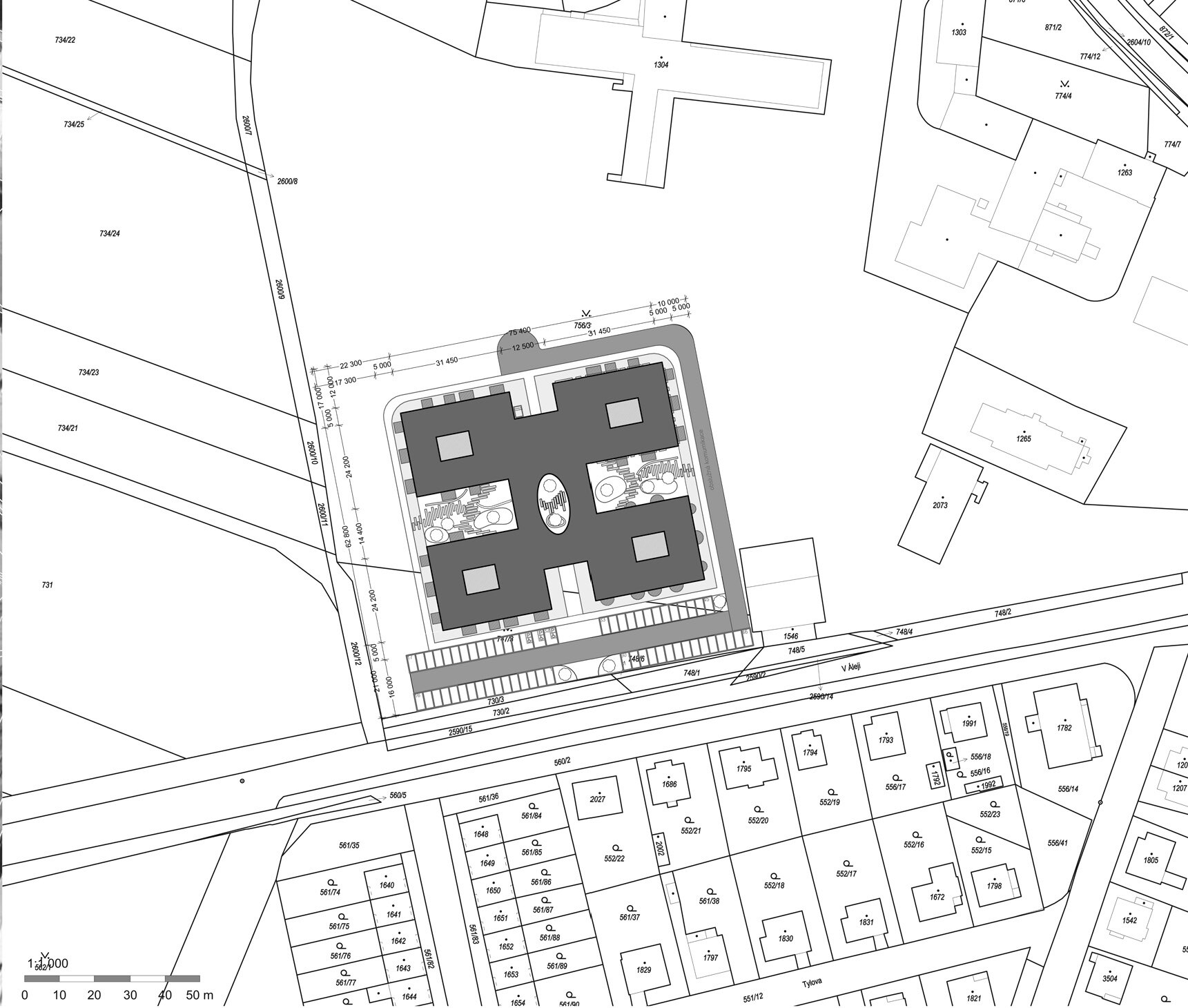 Site plan drawing showing the building footprint with central courtyards within the surrounding street grid
