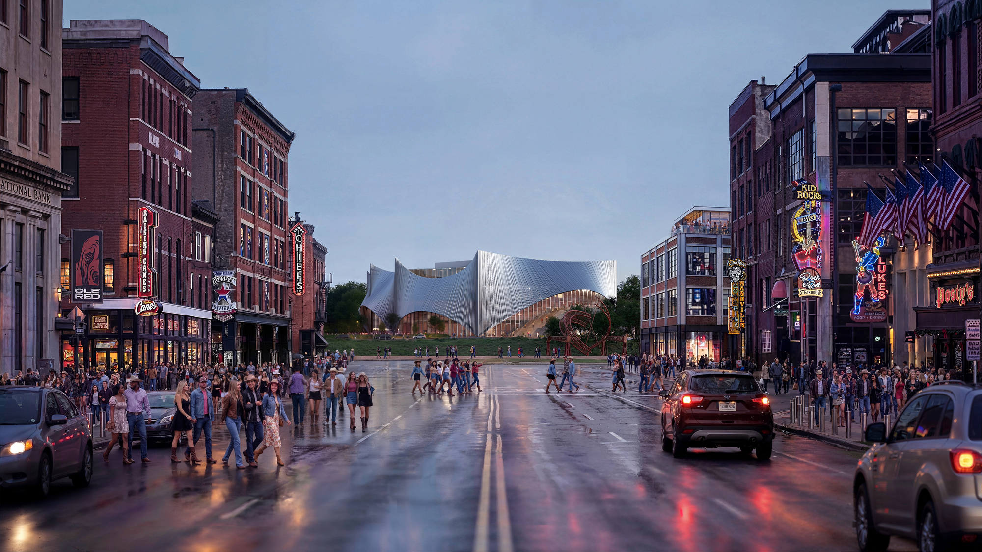 View down a wet street at dusk with pedestrians and cars facing the illuminated sculptural facade