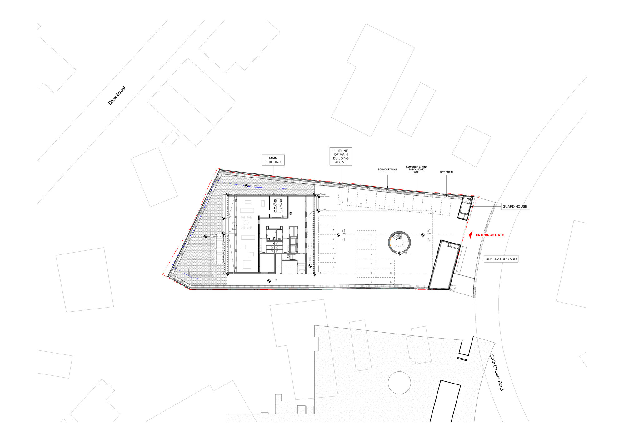 Ground floor plan drawing showing workspace areas and a circular feature within an angled site