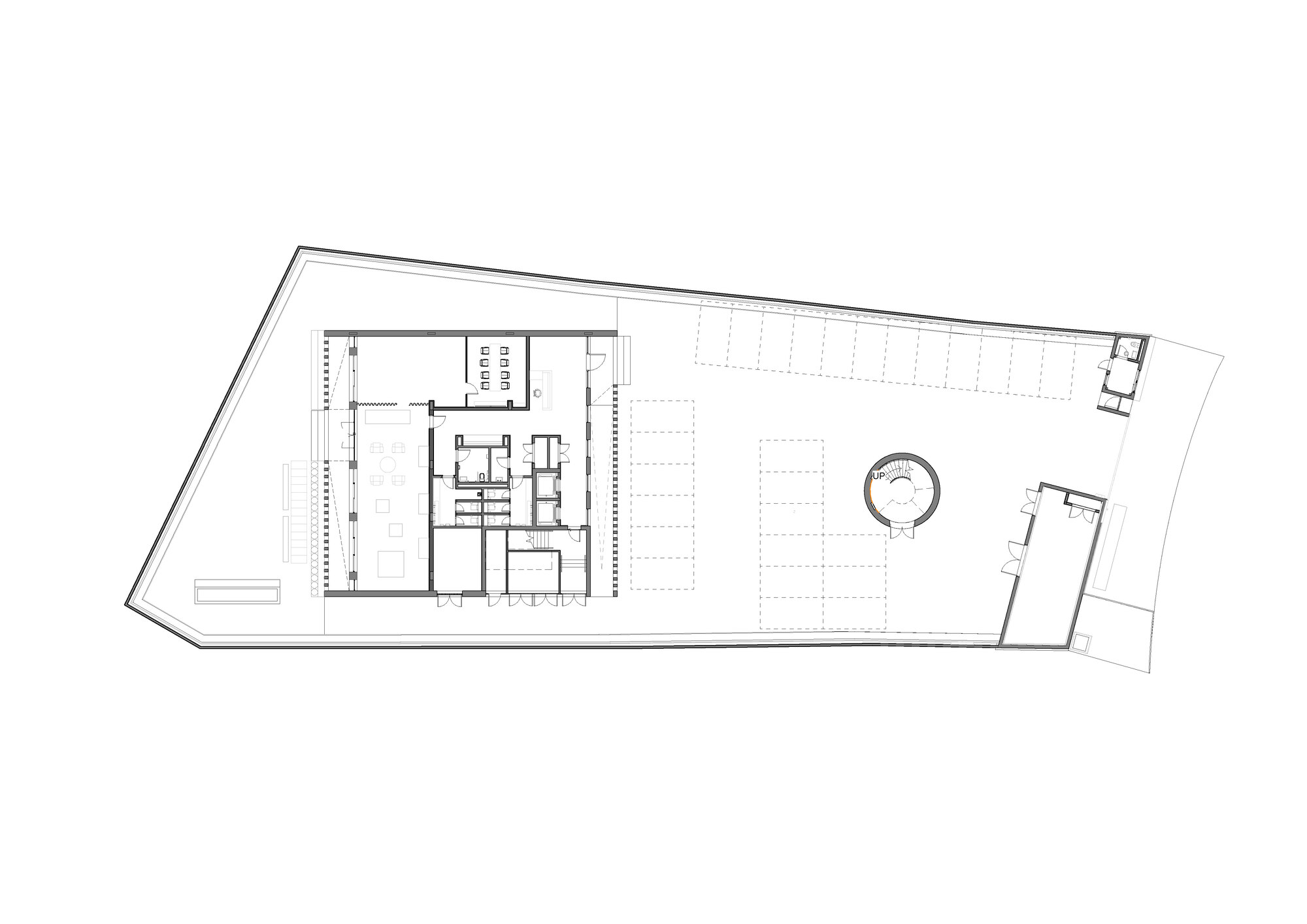 Floor plan drawing showing the full trapezoidal layout with rooms and courtyard zones