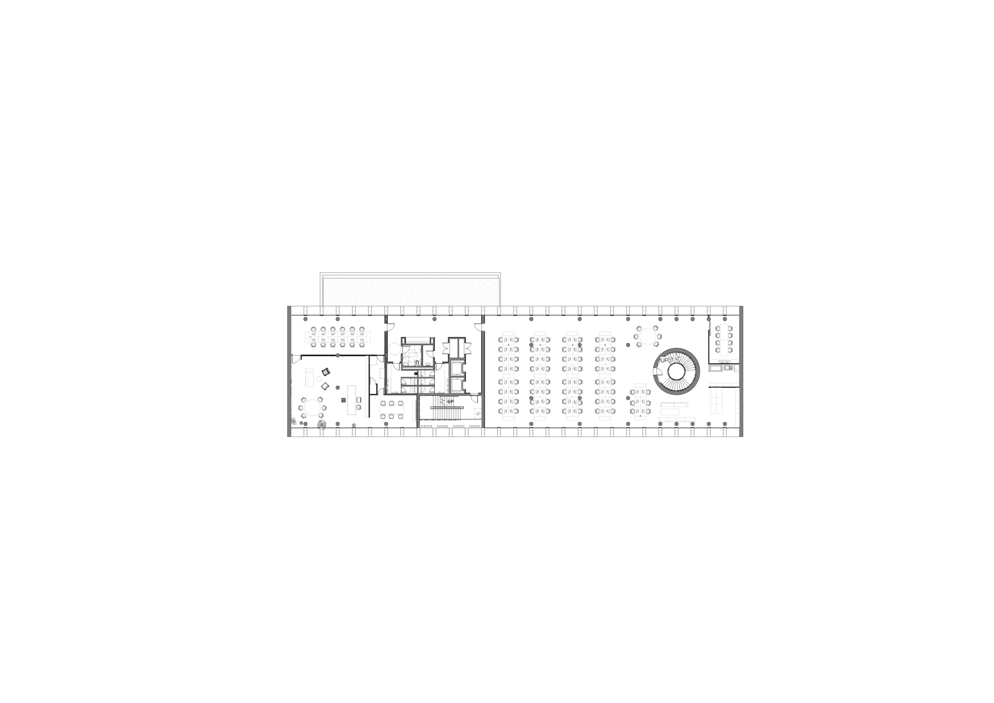 Floor plan drawing showing interior workspaces with furniture layouts and circular sculptural element