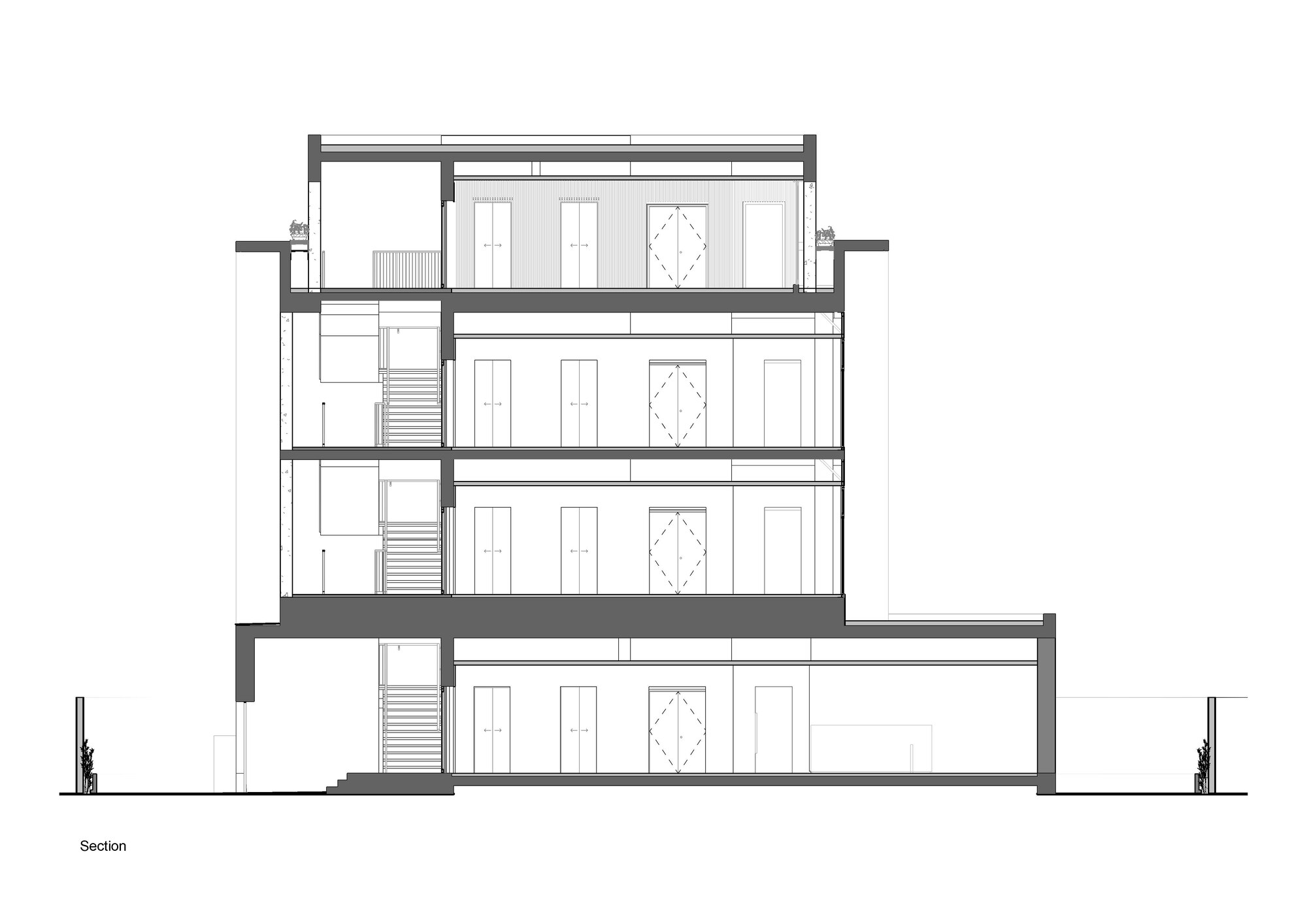 Section drawing illustrating four levels with central staircases and repetitive window openings along the facade