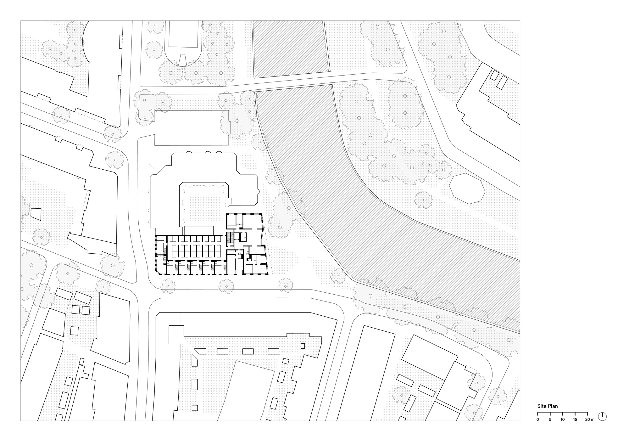 Site plan drawing showing the residential block positioned adjacent to a curving park and surrounding streets