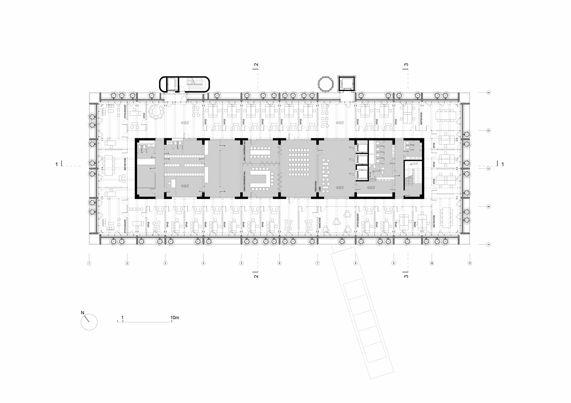Floor plan drawing showing central meeting areas surrounded by perimeter workspace zones and planted terraces