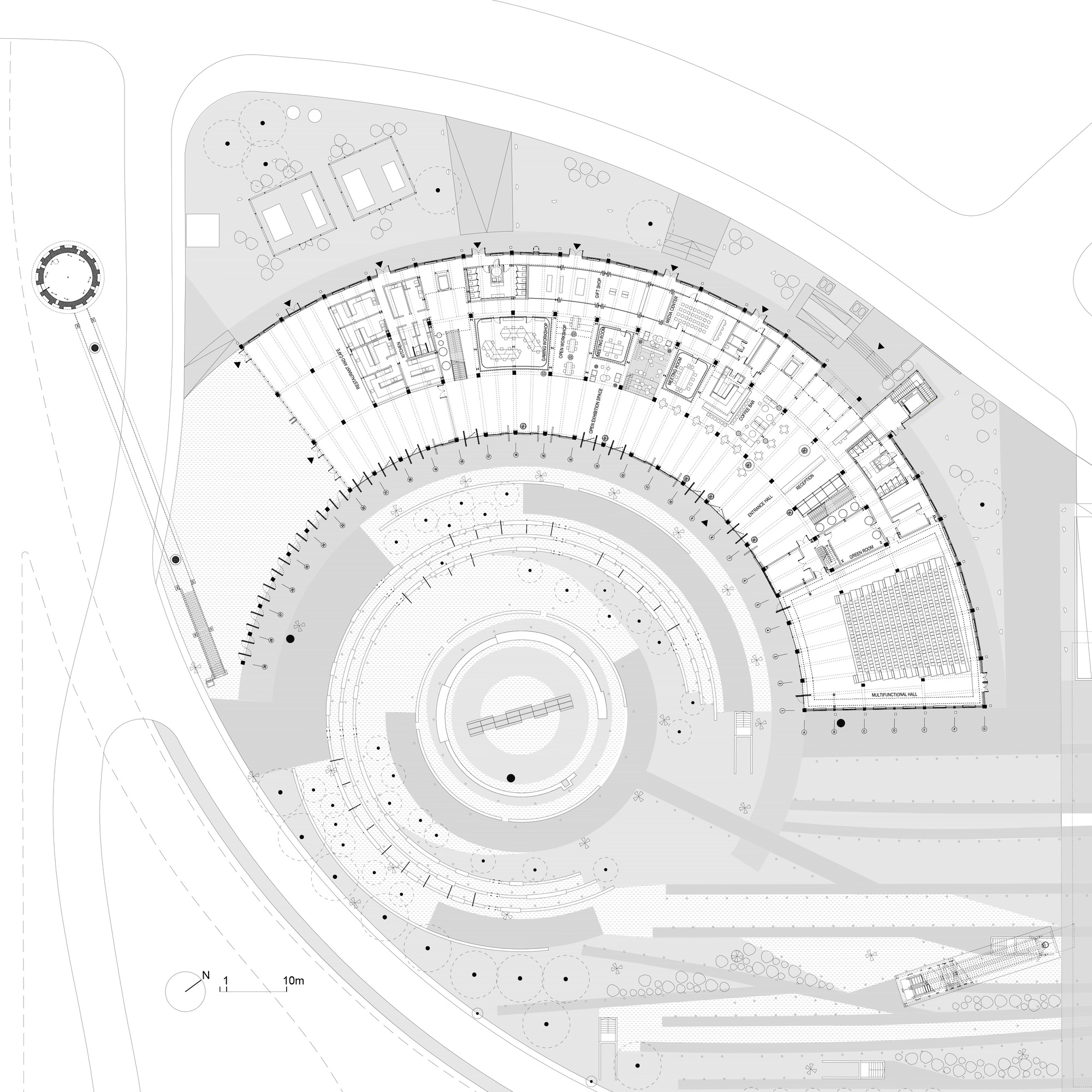 Site plan drawing showing a crescent-shaped building wrapping around a circular central courtyard with adjacent parking areas
