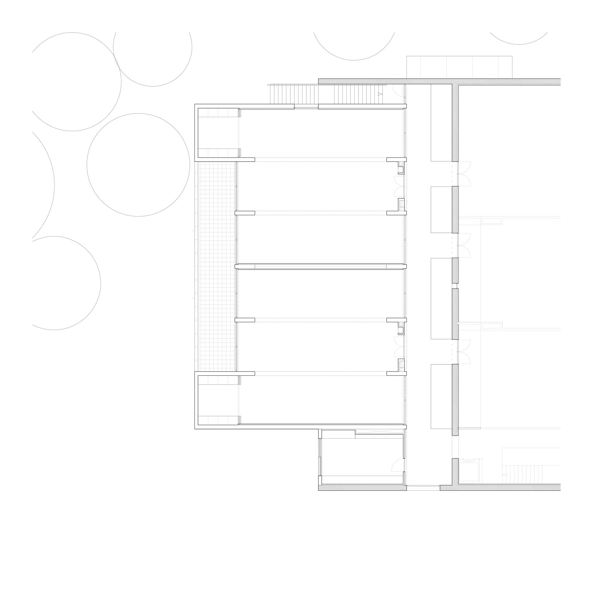 Upper floor plan drawing showing interior divisions with a gridded courtyard and surrounding trees