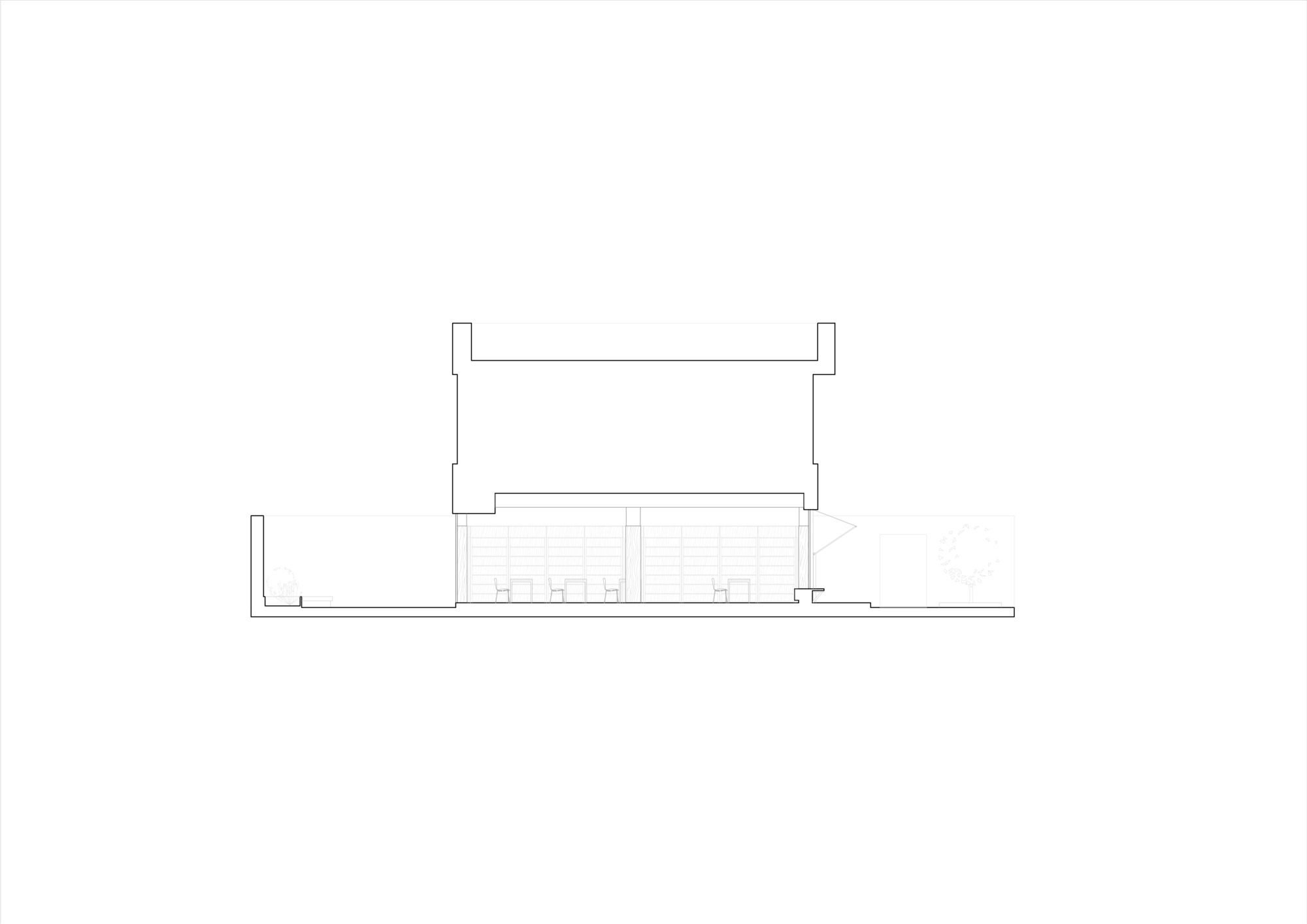 Section drawing showing a two-story volume with upper terrace and lower ground-level spaces