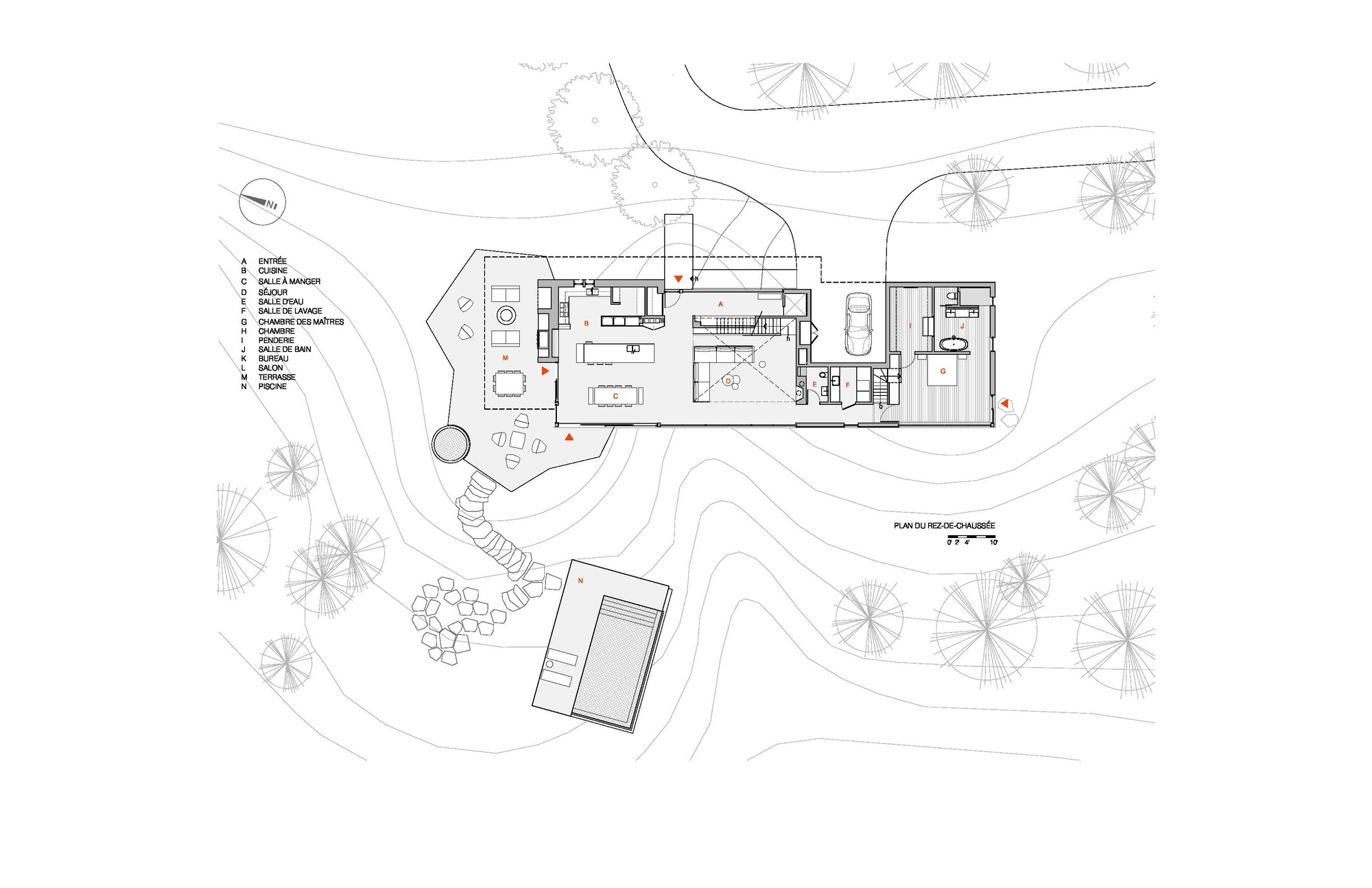 Site plan drawing depicting the main volume and detached structure within landscaped terrain and tree symbols