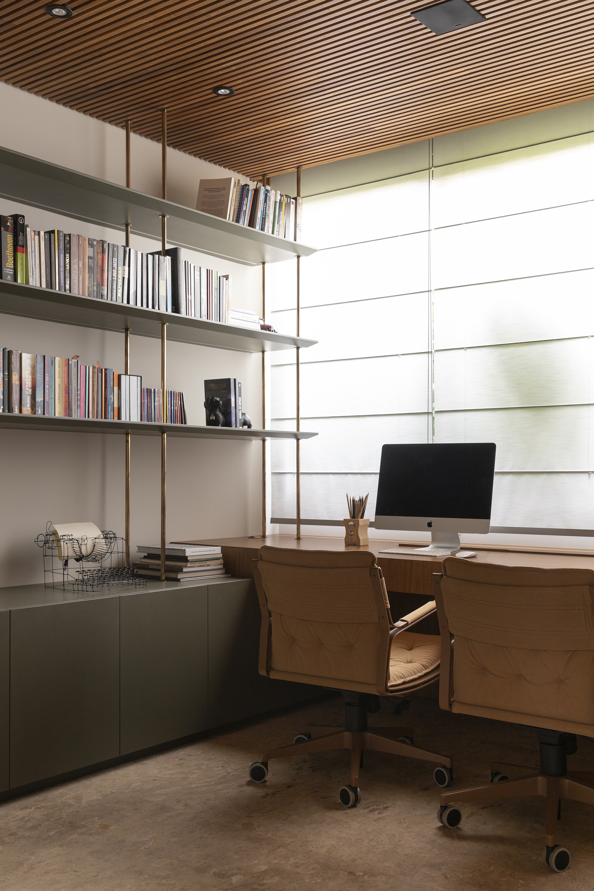 Home office with timber slat ceiling and translucent horizontal panel window wall
