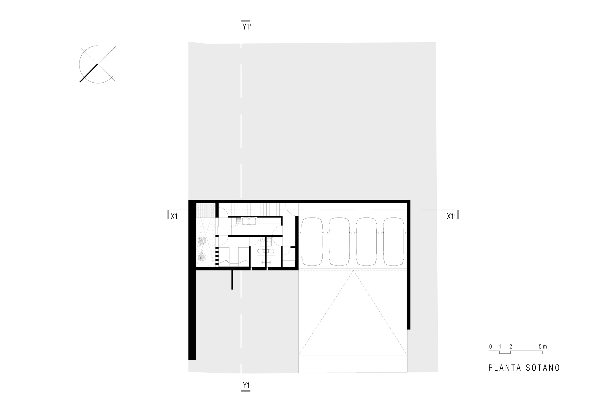 Basement floor plan showing bathroom facilities and a four-car garage with angled access