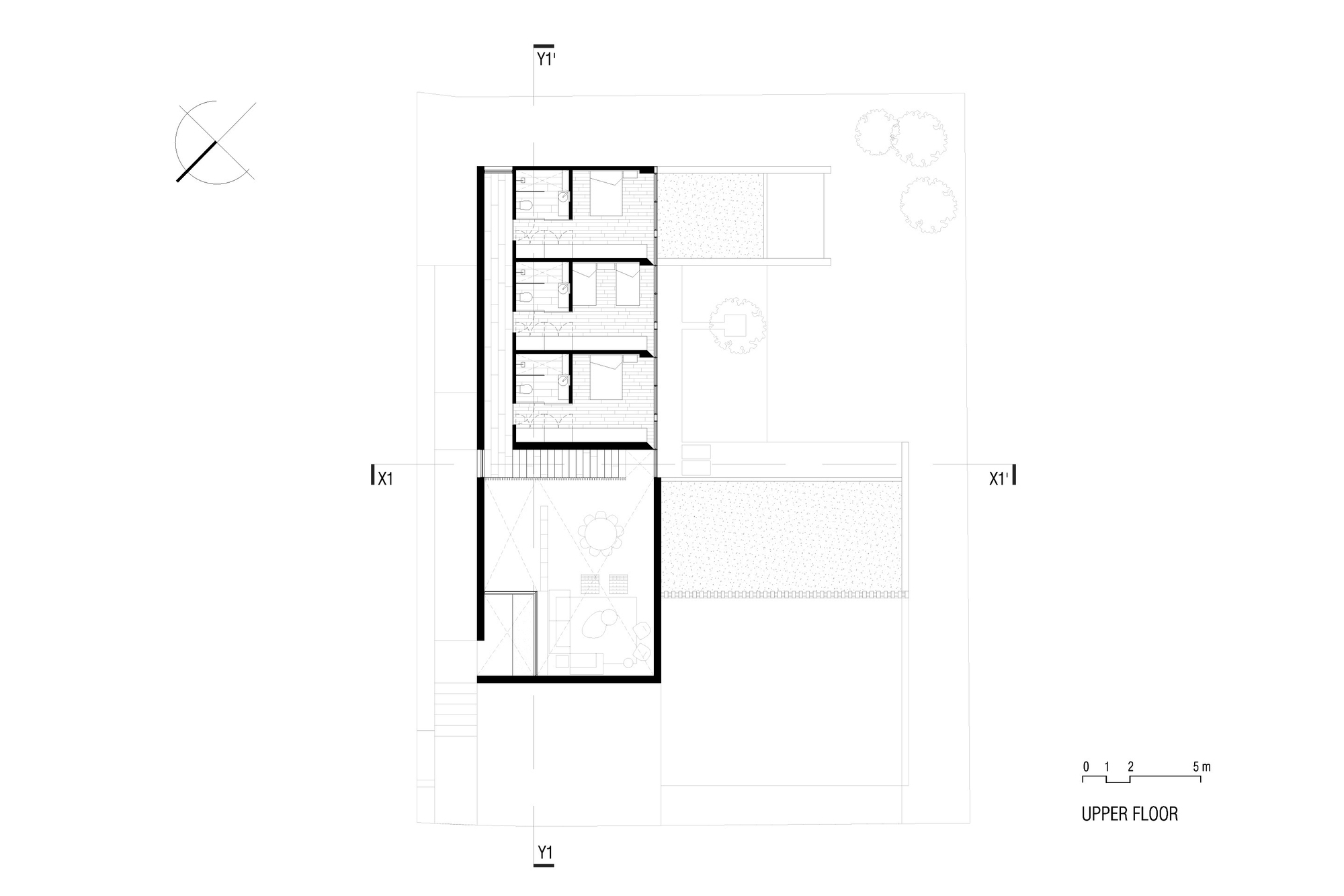 Upper floor plan drawing showing three bedrooms along one wing and an open terrace area