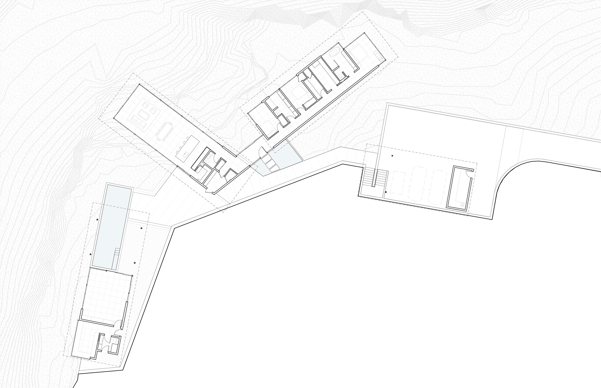 Site plan drawing showing angled building volumes following contour lines on sloped terrain