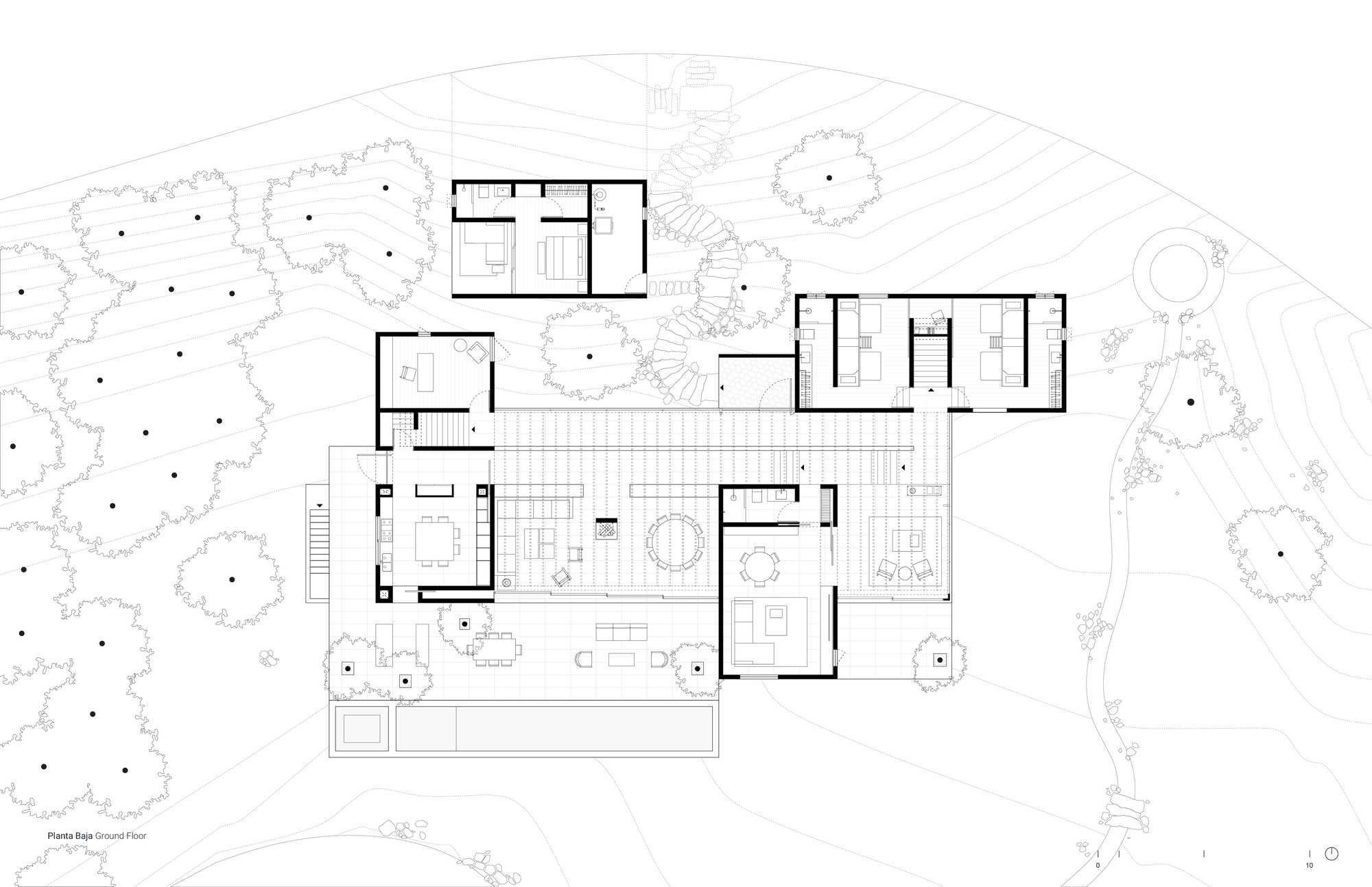 Ground floor plan drawing showing open living areas and bedroom wings extending through the landscape