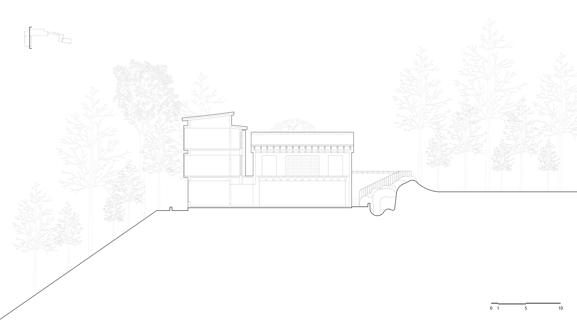 Section drawing revealing a two-story volume with clerestory windows set into a sloping hillside with trees