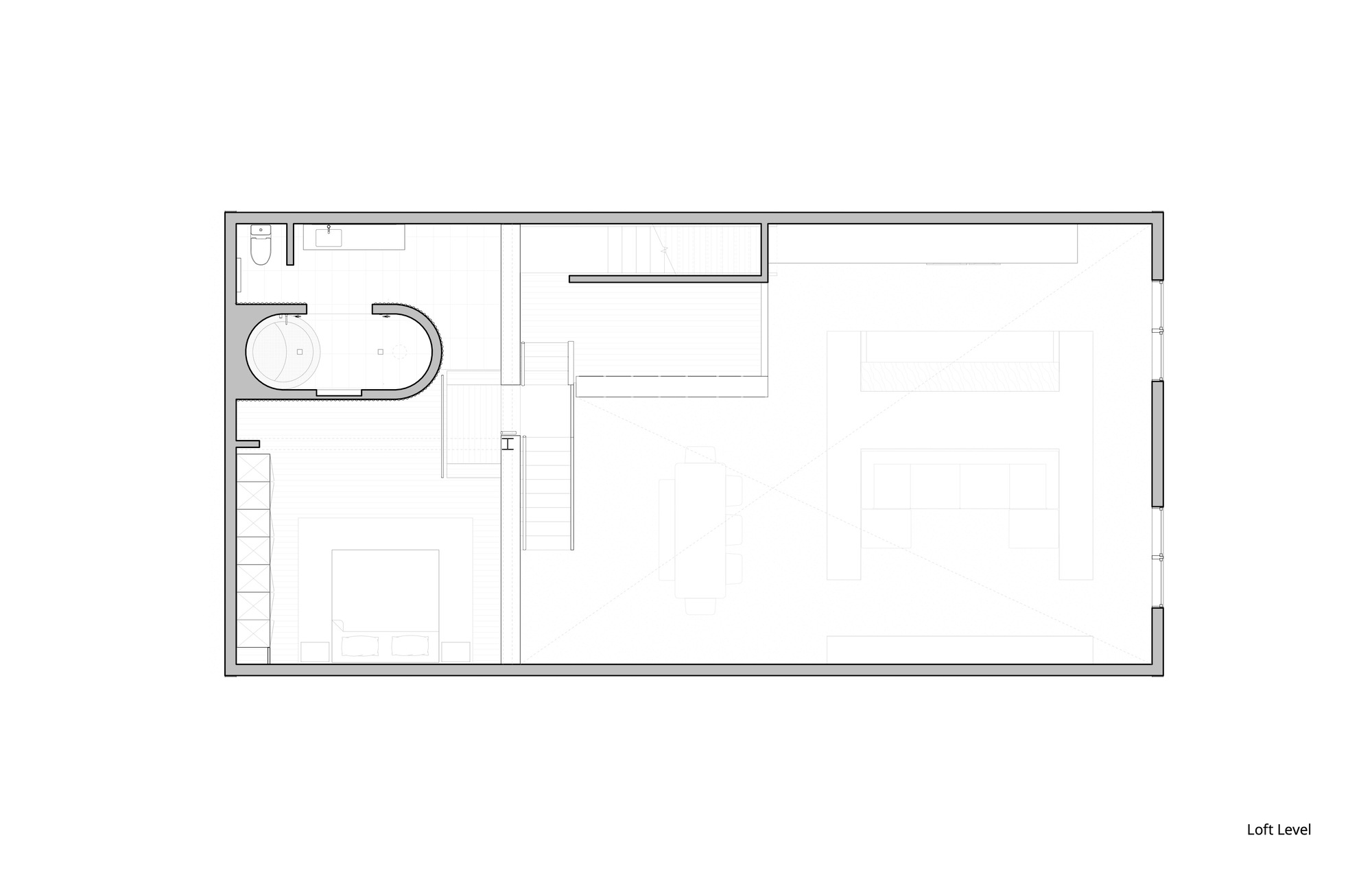 Loft level floor plan drawing showing bathroom and open bedroom area with stair access