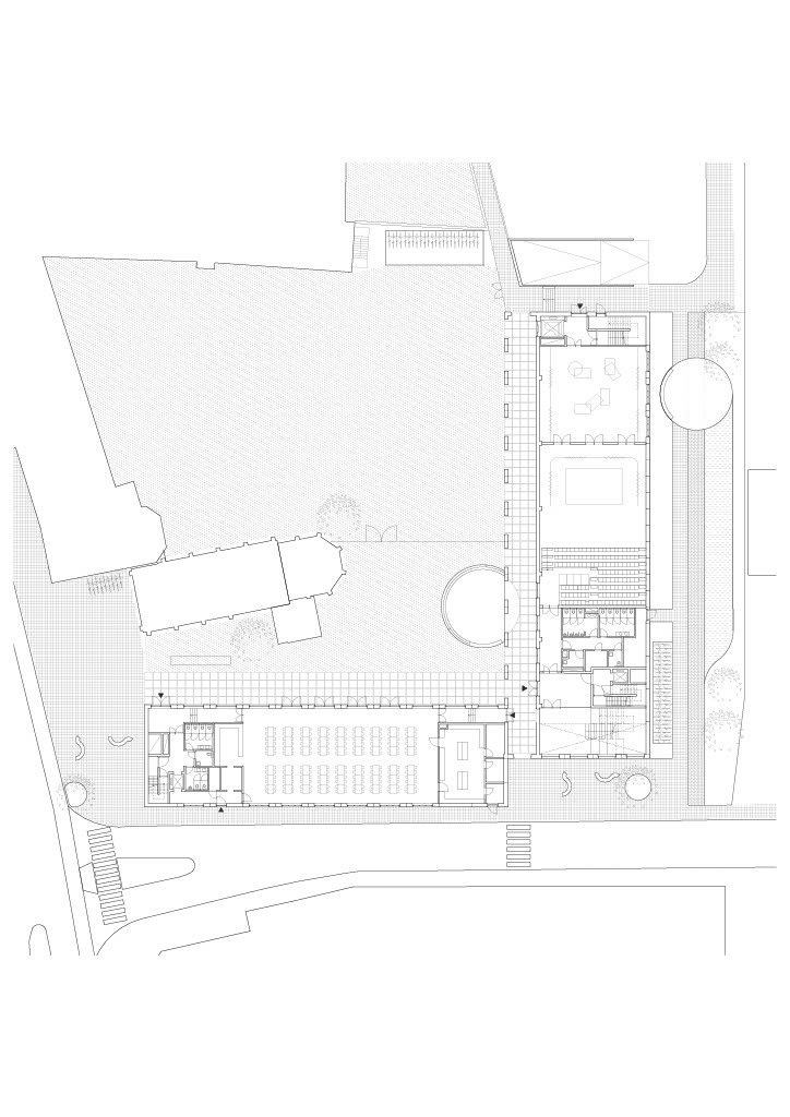 Site plan drawing showing an irregular courtyard layout with surrounding structures and circular elements