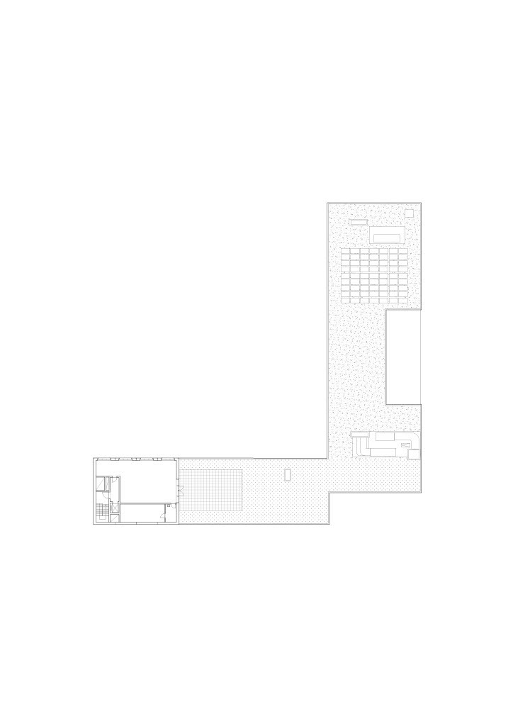 Floor plan drawing showing an L-shaped layout with textured paving zones and interior rooms