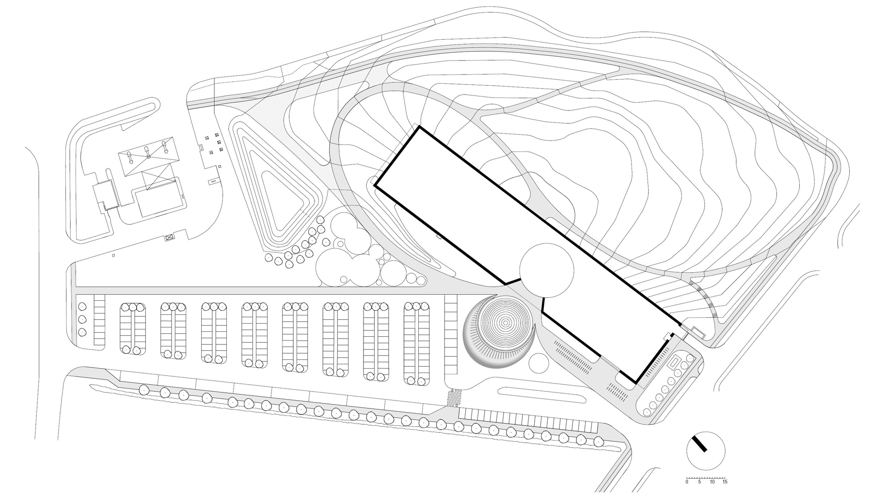 Site plan drawing showing an angled building with parking rows and topographic contours