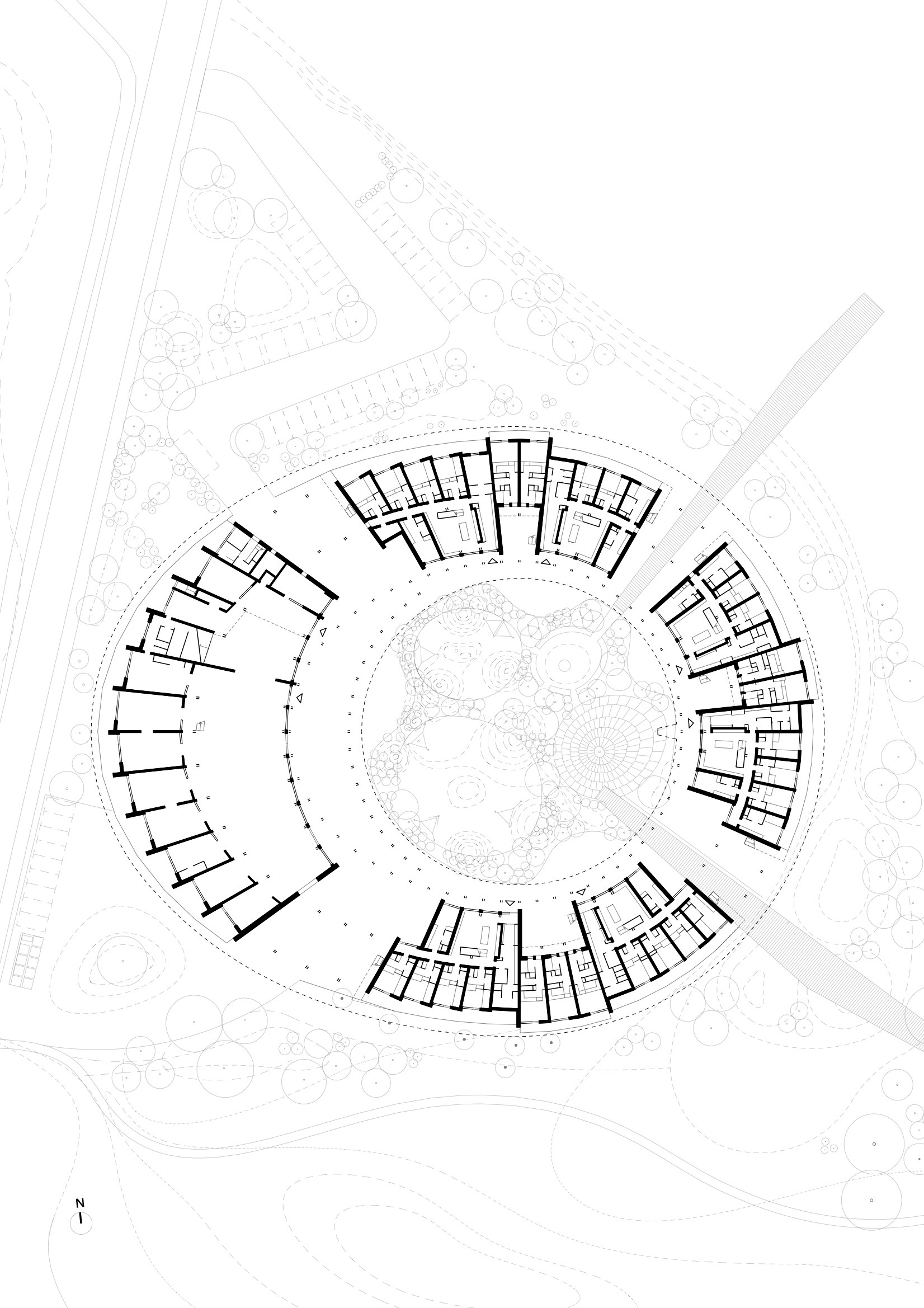 Floor plan drawing showing ring-shaped layout with central courtyard and radiating residential units