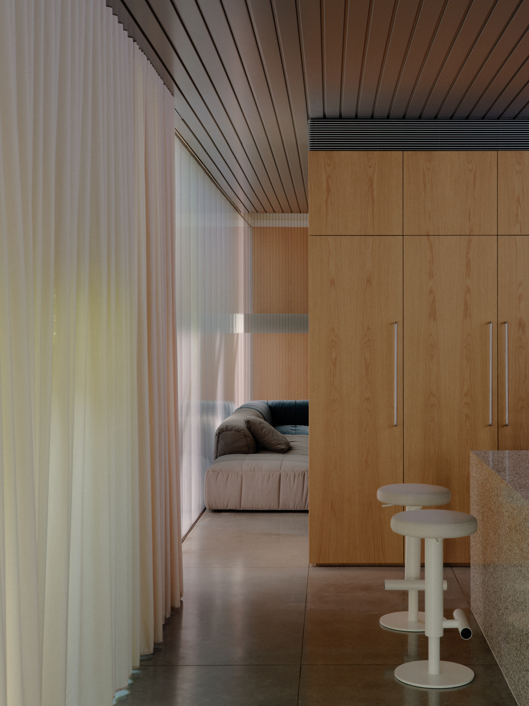 Bedroom threshold with wood cabinetry and white side tables beneath slatted timber ceiling