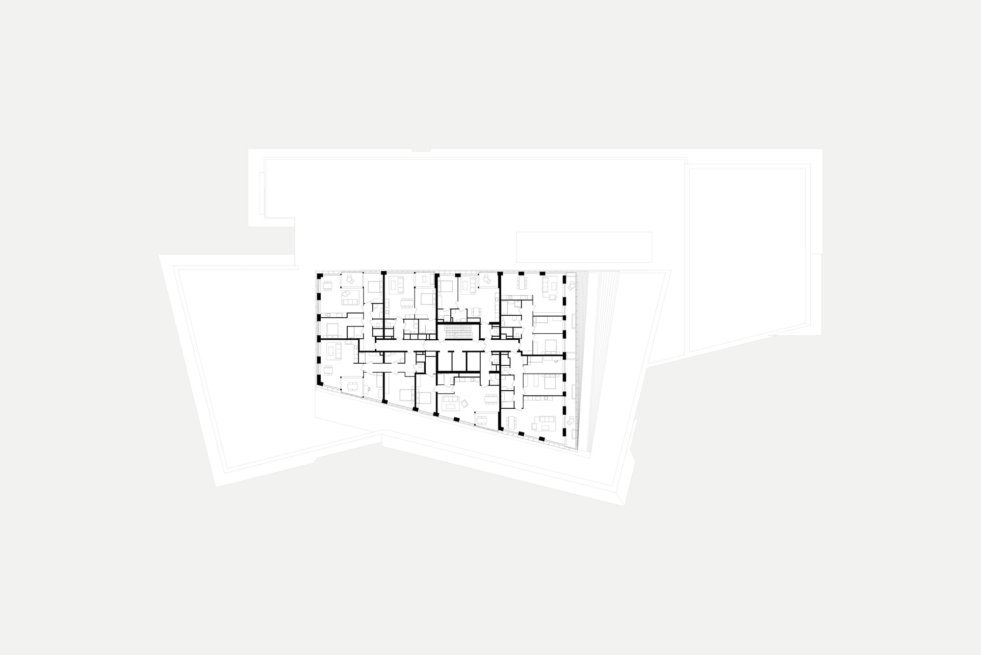 Floor plan drawing depicting residential units organized along a central corridor with exterior terraces
