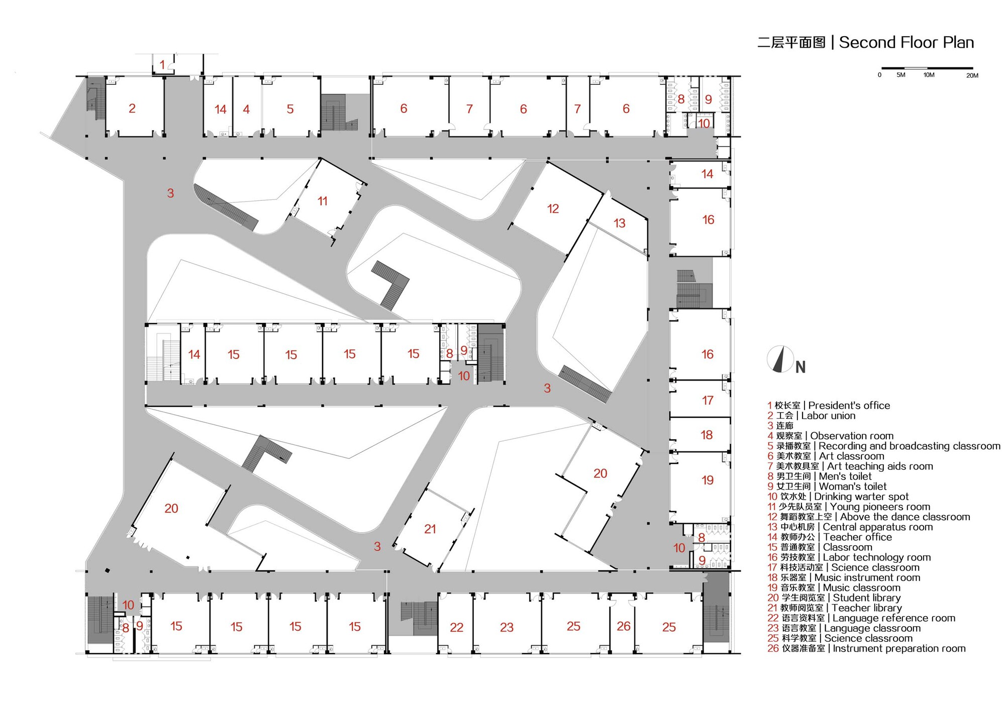 Second floor plan illustrating double-height voids connecting to classrooms and administrative spaces below